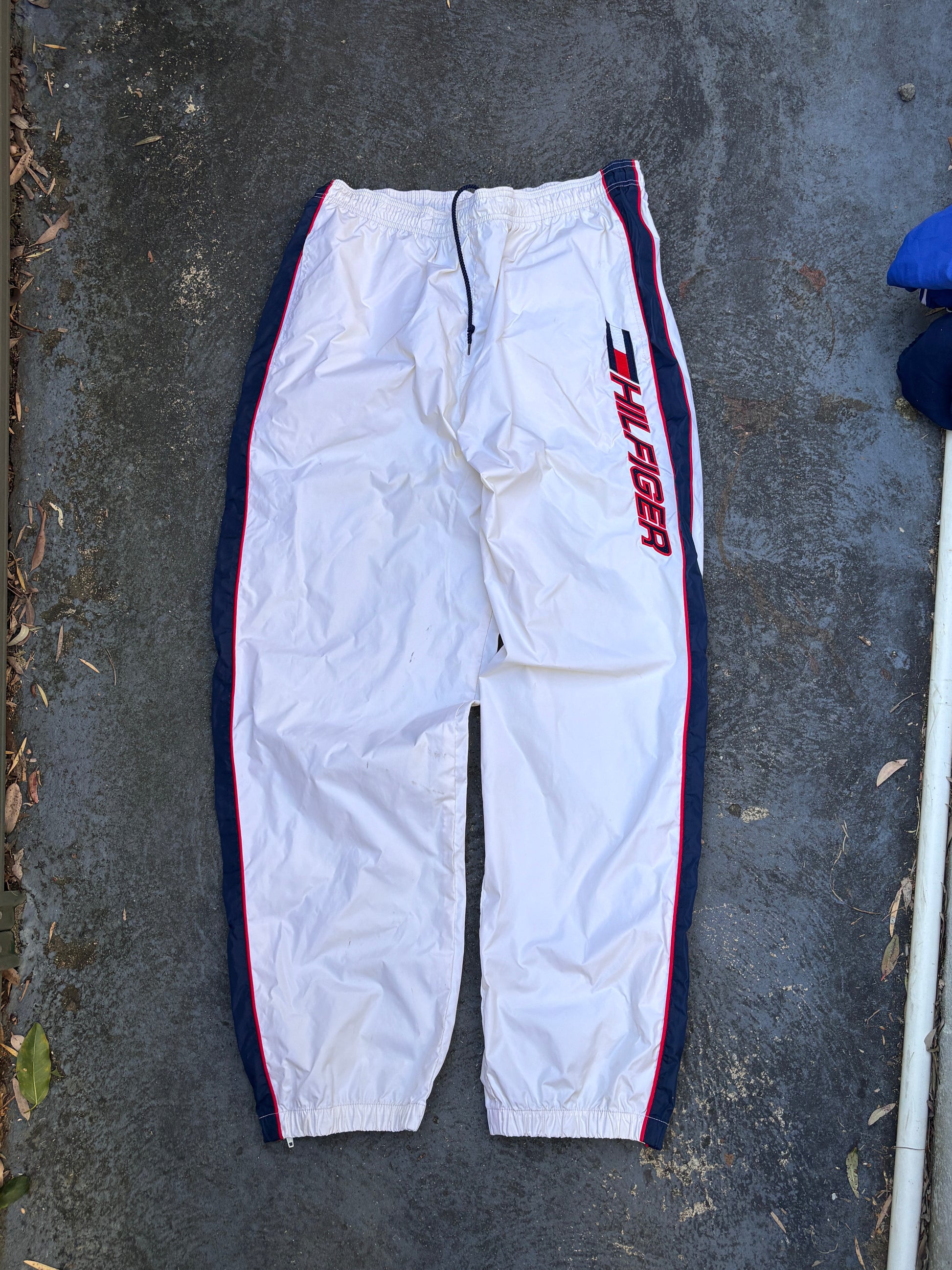 Vintage 90s Tommy Hilfiger Athletics Track Pants Size L White Blue Red Spell Out Nylon Windbreaker
