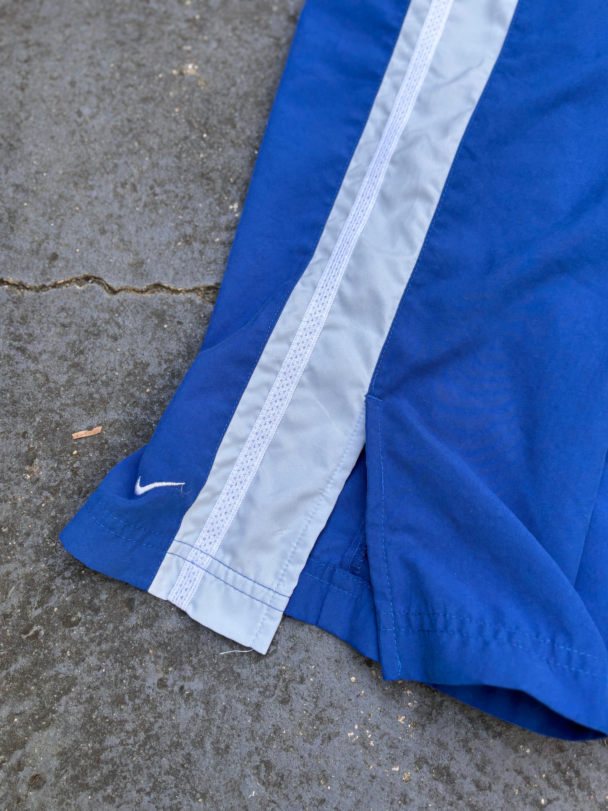 Vintage Y2K Nike Track Pants Women’s Size M Two-Tone Blue Wide Leg Ankle Slit Swoosh