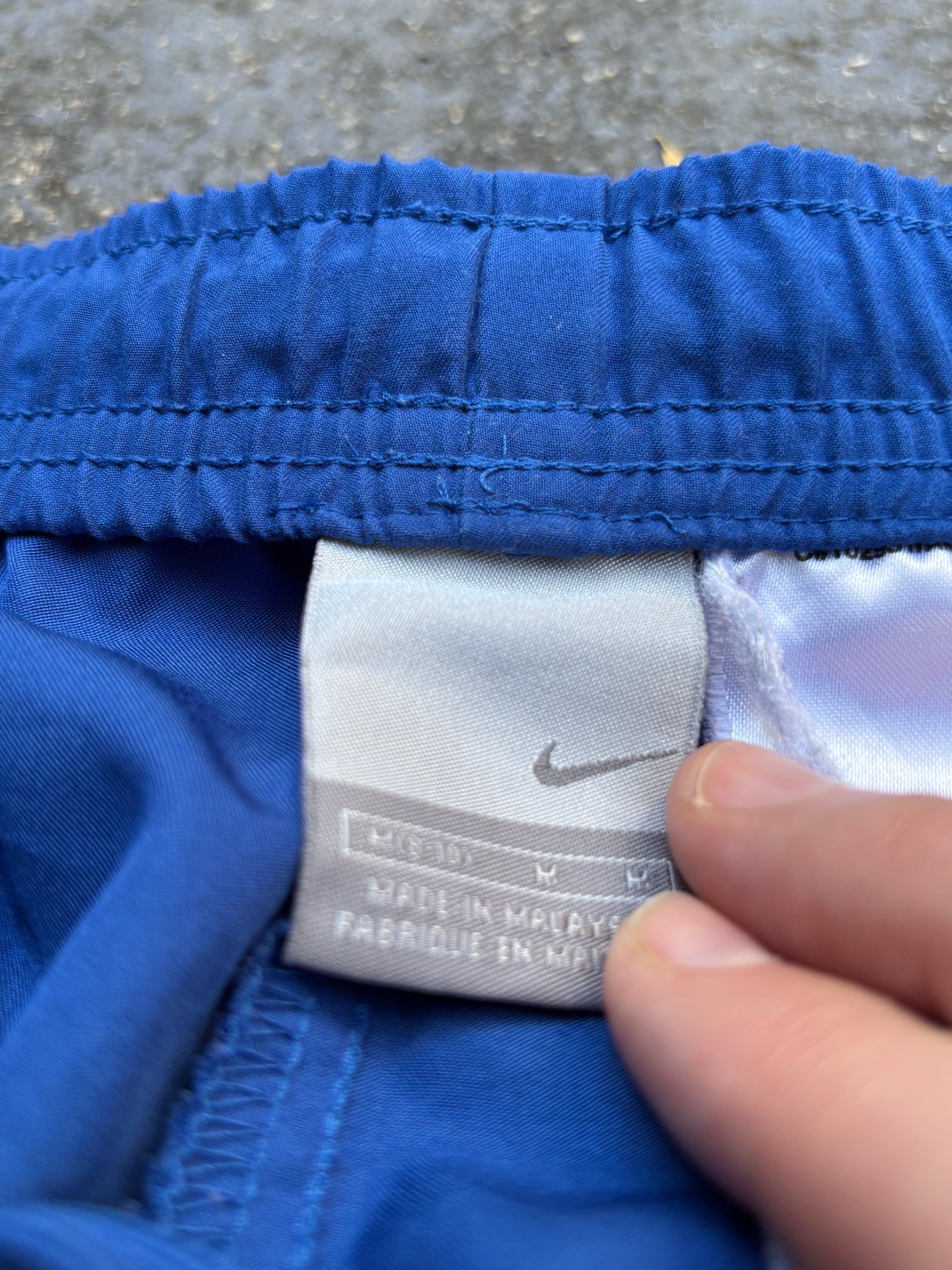 Vintage Y2K Nike Track Pants Women’s Size M Two-Tone Blue Wide Leg Ankle Slit Swoosh