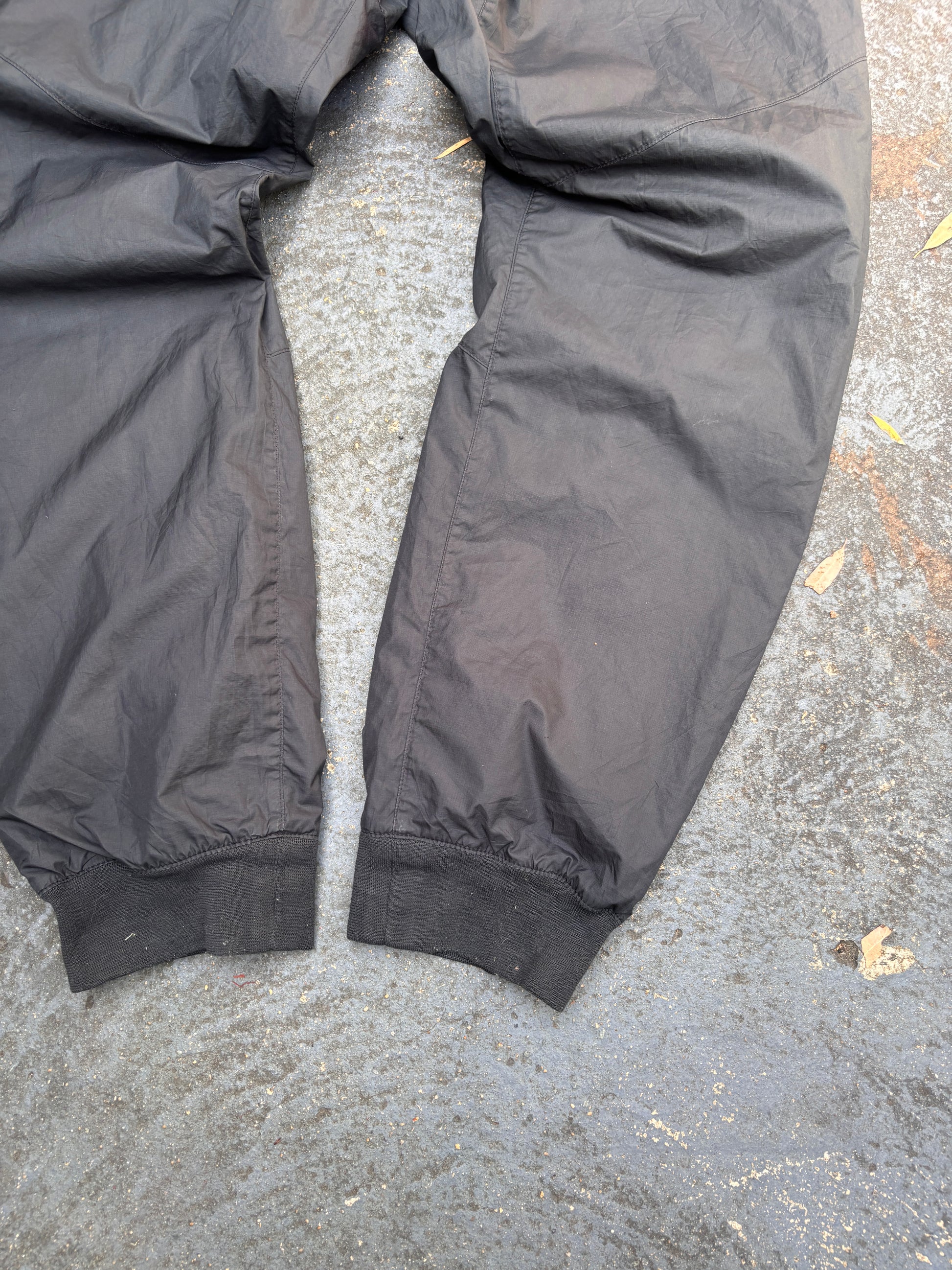 Nike Track Pants Women’s Size L Black Hip Logo Tapered Button Zip Drawstring