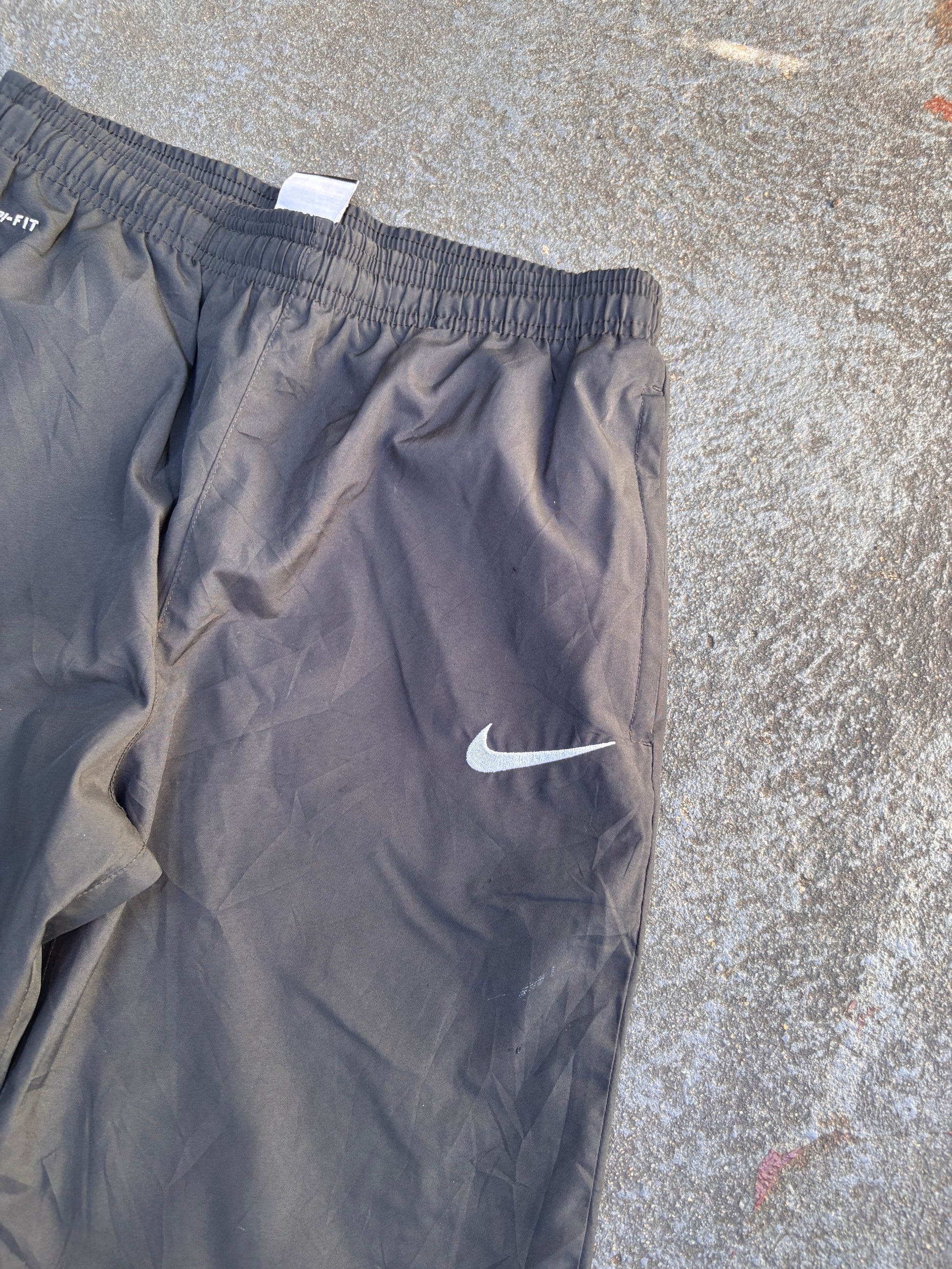 Nike Dri-Fit Track Pants Size S Black White Swoosh Straight Leg Ankle Zip