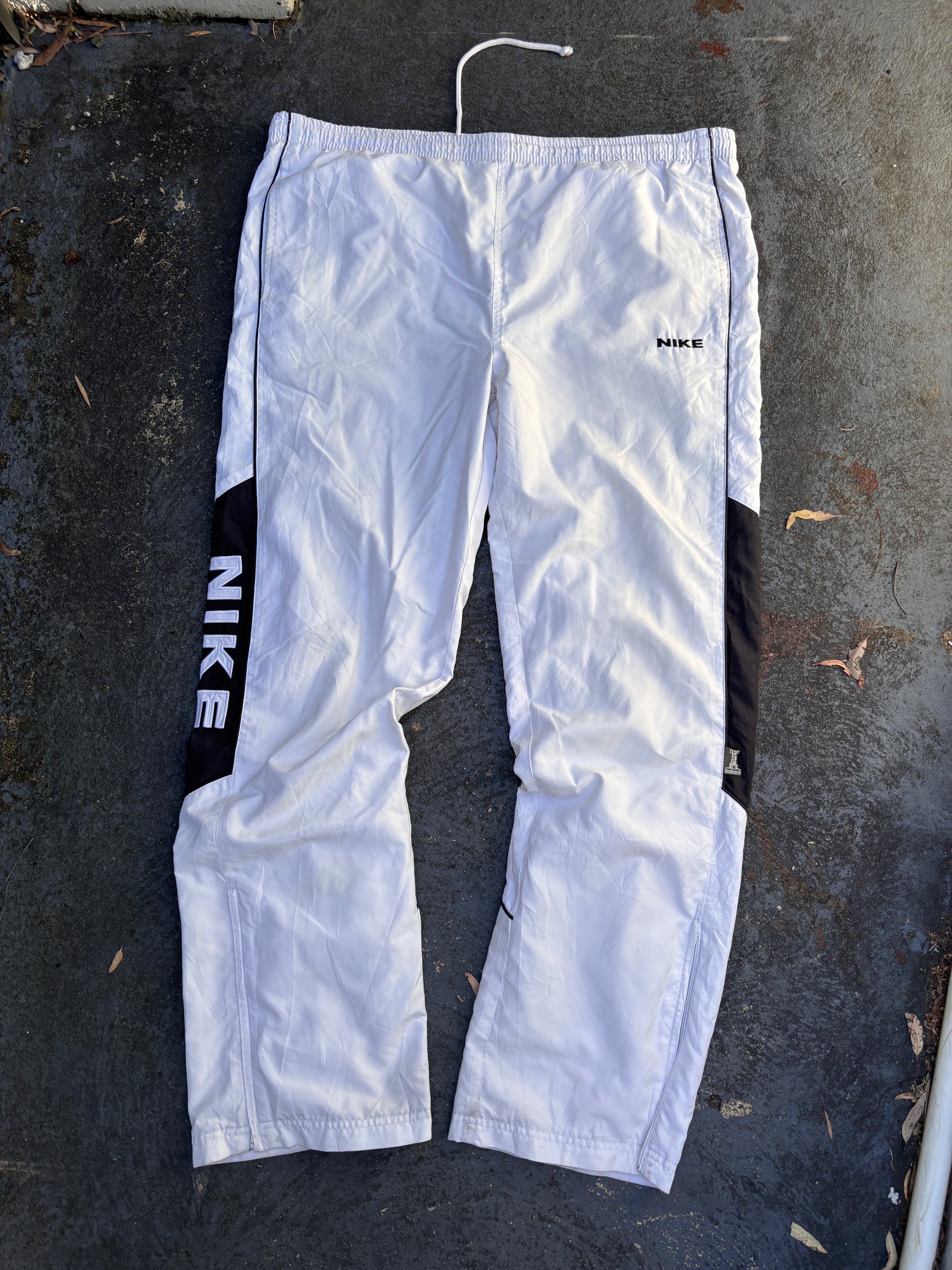 Vintage 90s Nike Spain Track Pants Size L White Navy Piping Spell Out RARE