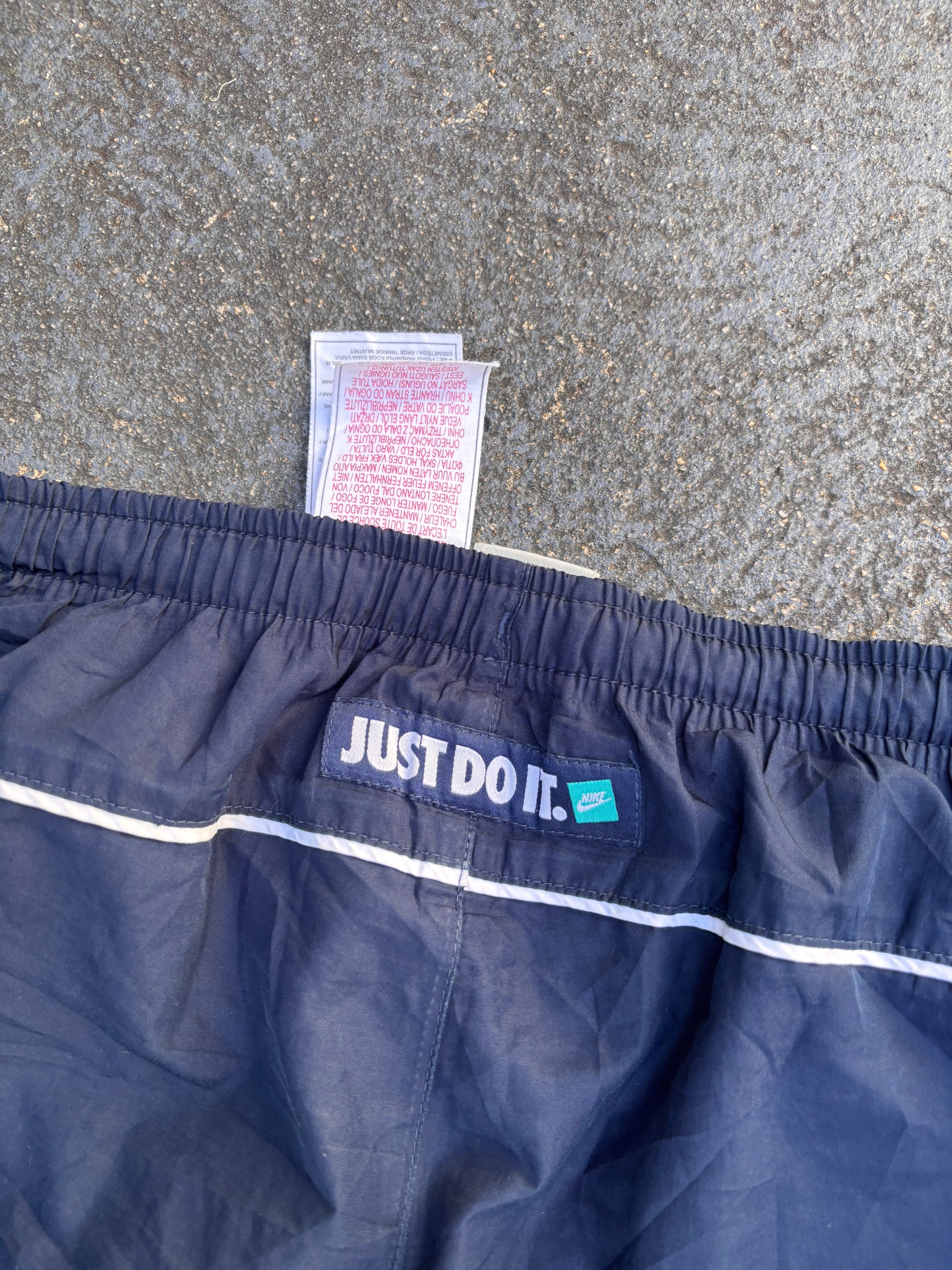 Vintage Y2K Nike Track Pants Size M Navy White Detail Just Do It Back Wide Leg Ankle Zip