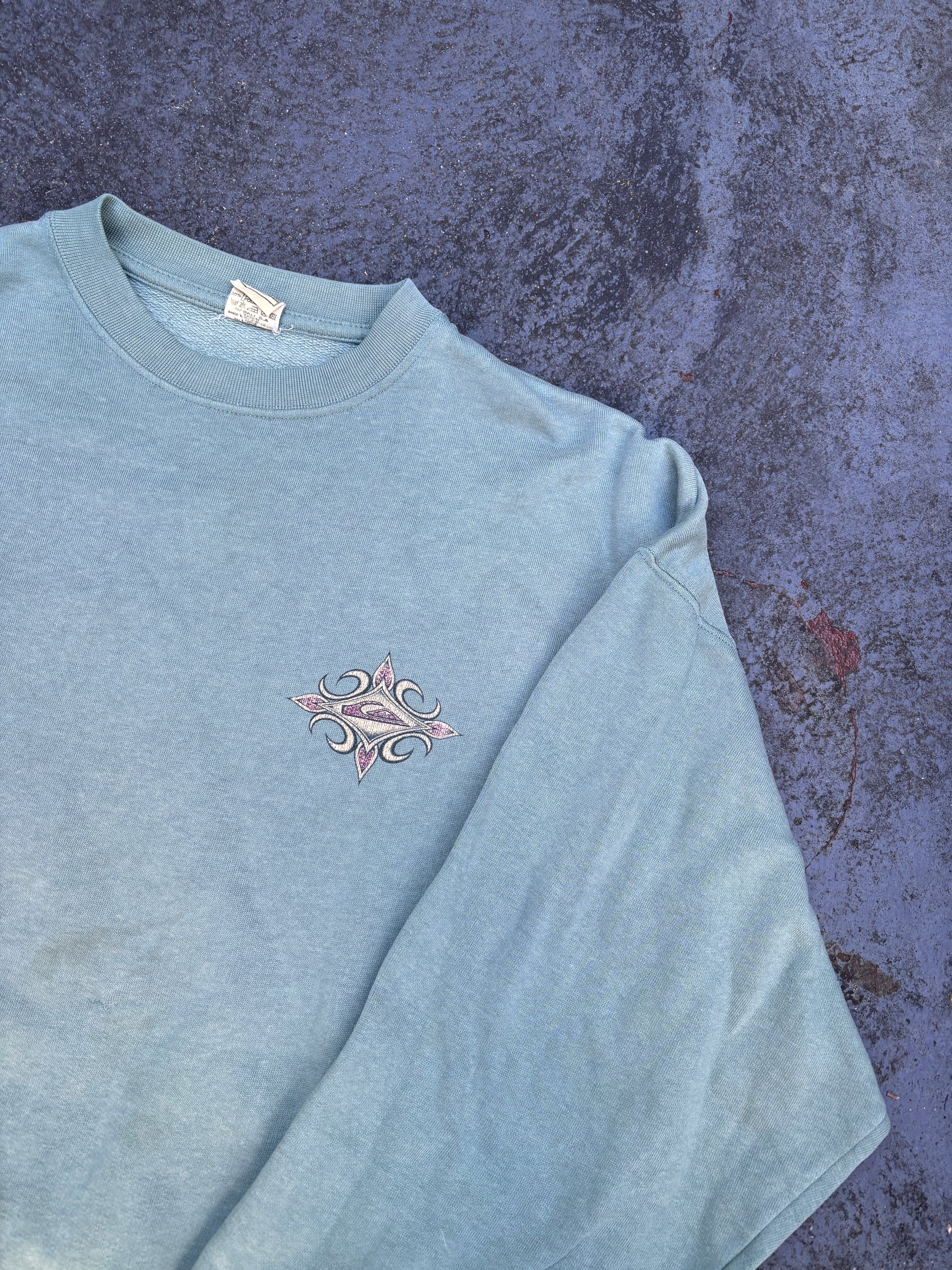 Vintage 90s Quiksilver Jumper Size M Green Large Tribal Logo Surf Wear Crew Neck