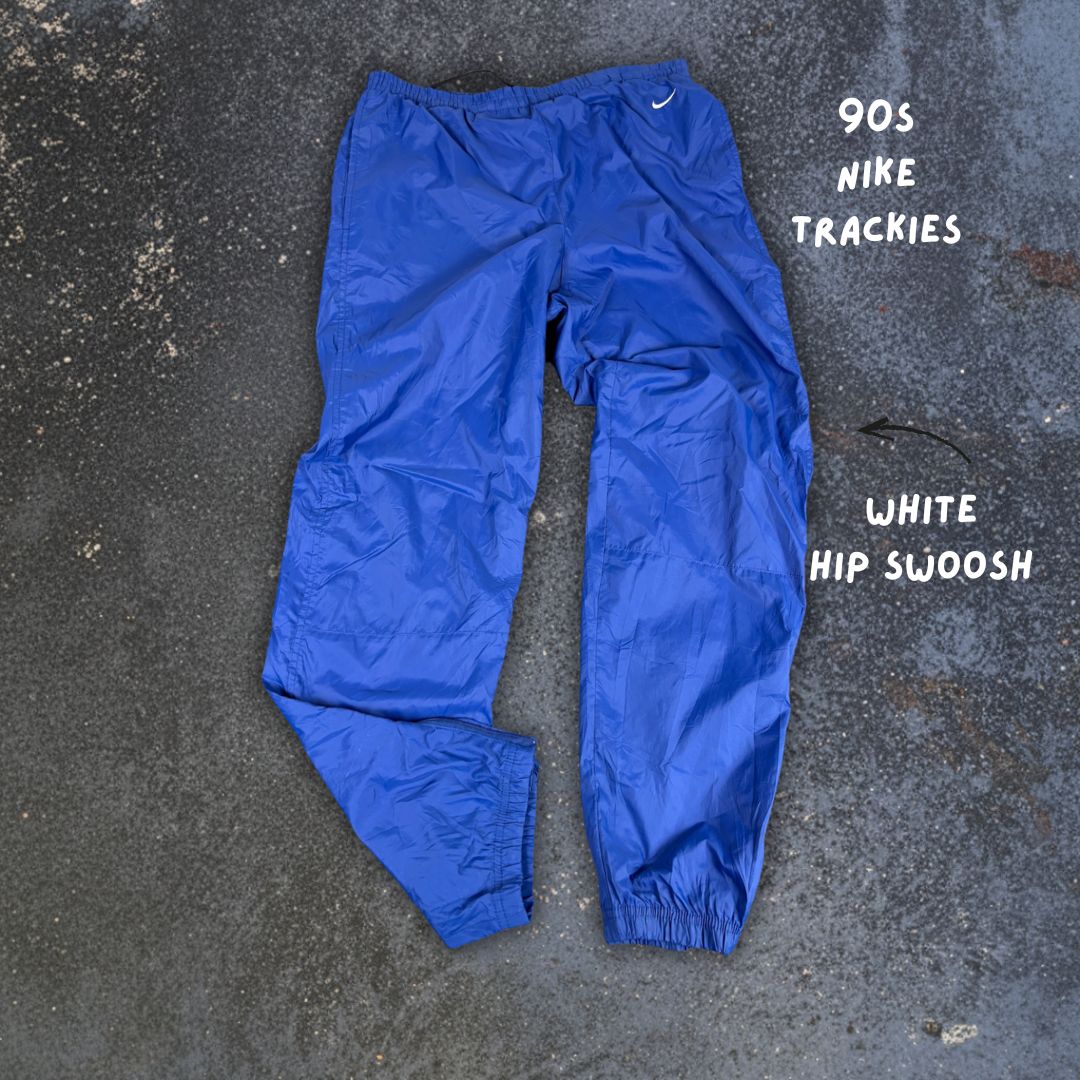 Vintage 90's Nike Track Pants Women's M Blue White Hip Swoosh Parachute Ankle Zip Straight Leg