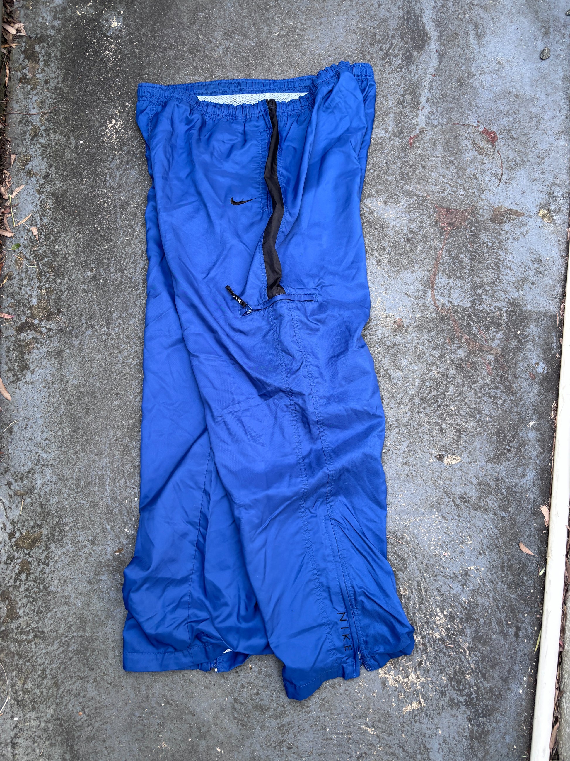 Vintage 90s Nike Track Pants Size XL Blue Black Swoosh Spell Out Logo Classic Windbreakers