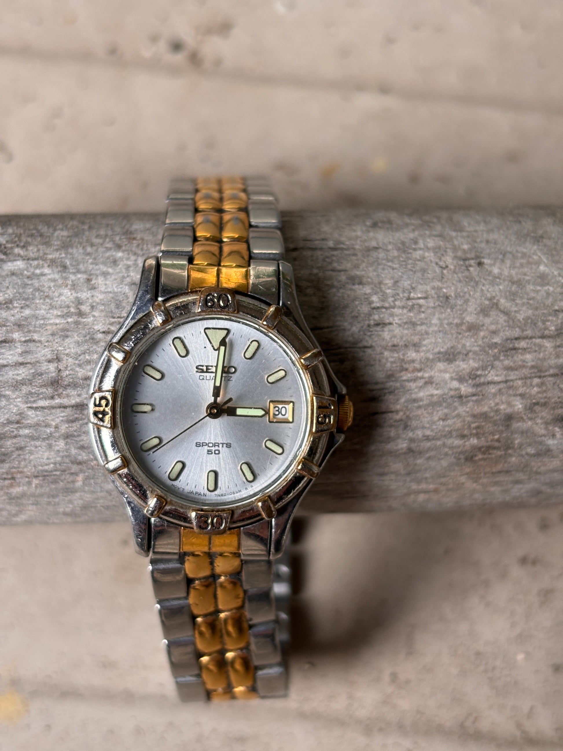 Seiko Sports 50 Ladies Analogue Stainless Steel Gold Tone Watch 7N82-0261