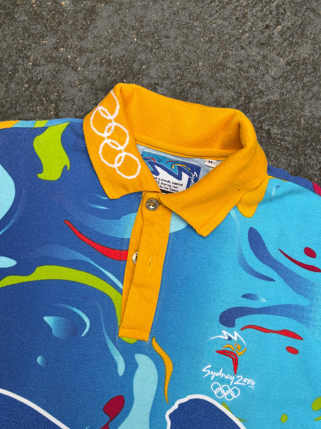 Vintage Y2K Bonds Sydney Olympics Polo Shirt Size M Multi 2000 All Over Graphic