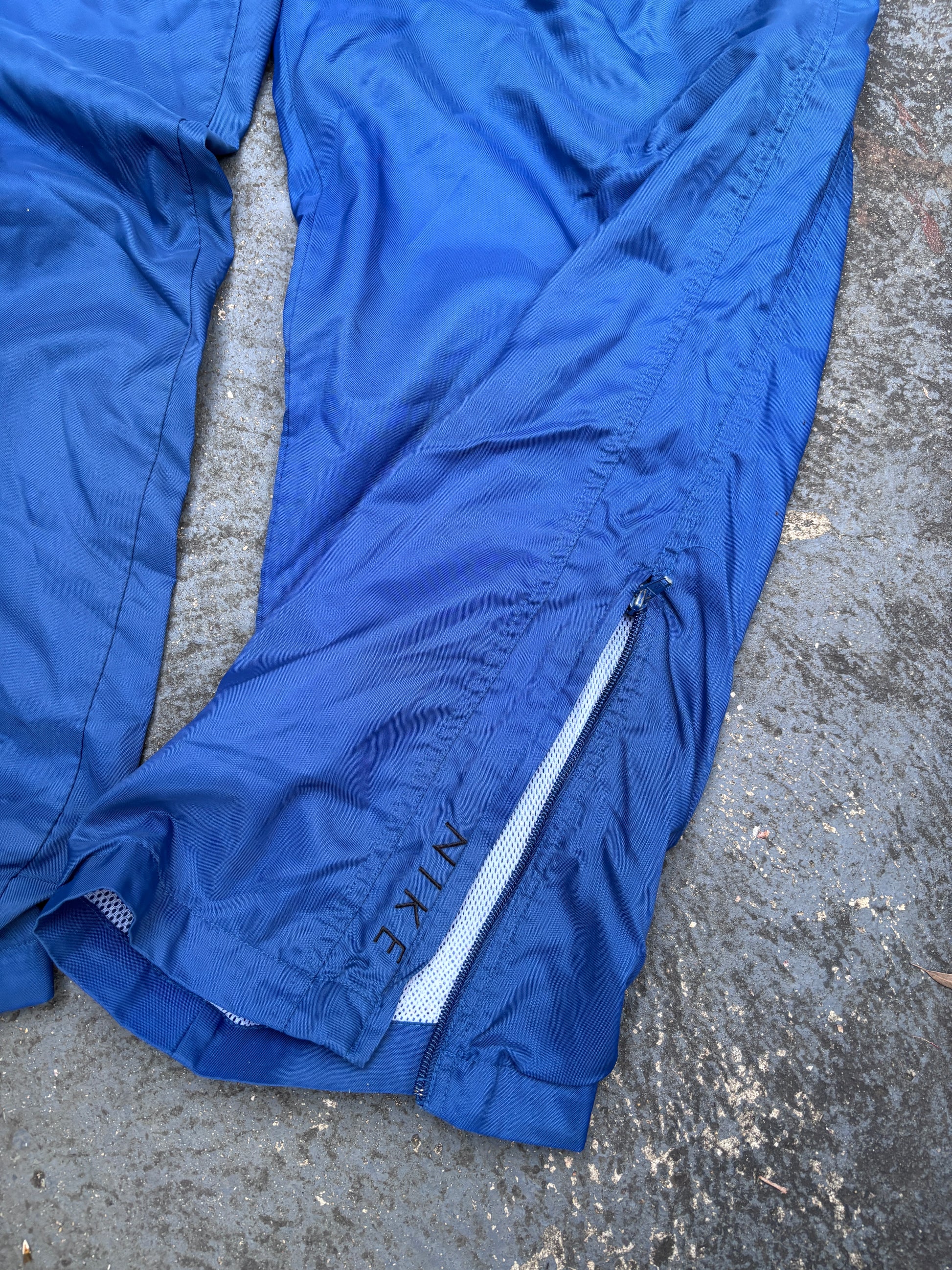 Vintage 90s Nike Track Pants Size XL Blue Black Swoosh Spell Out Logo Classic Windbreakers