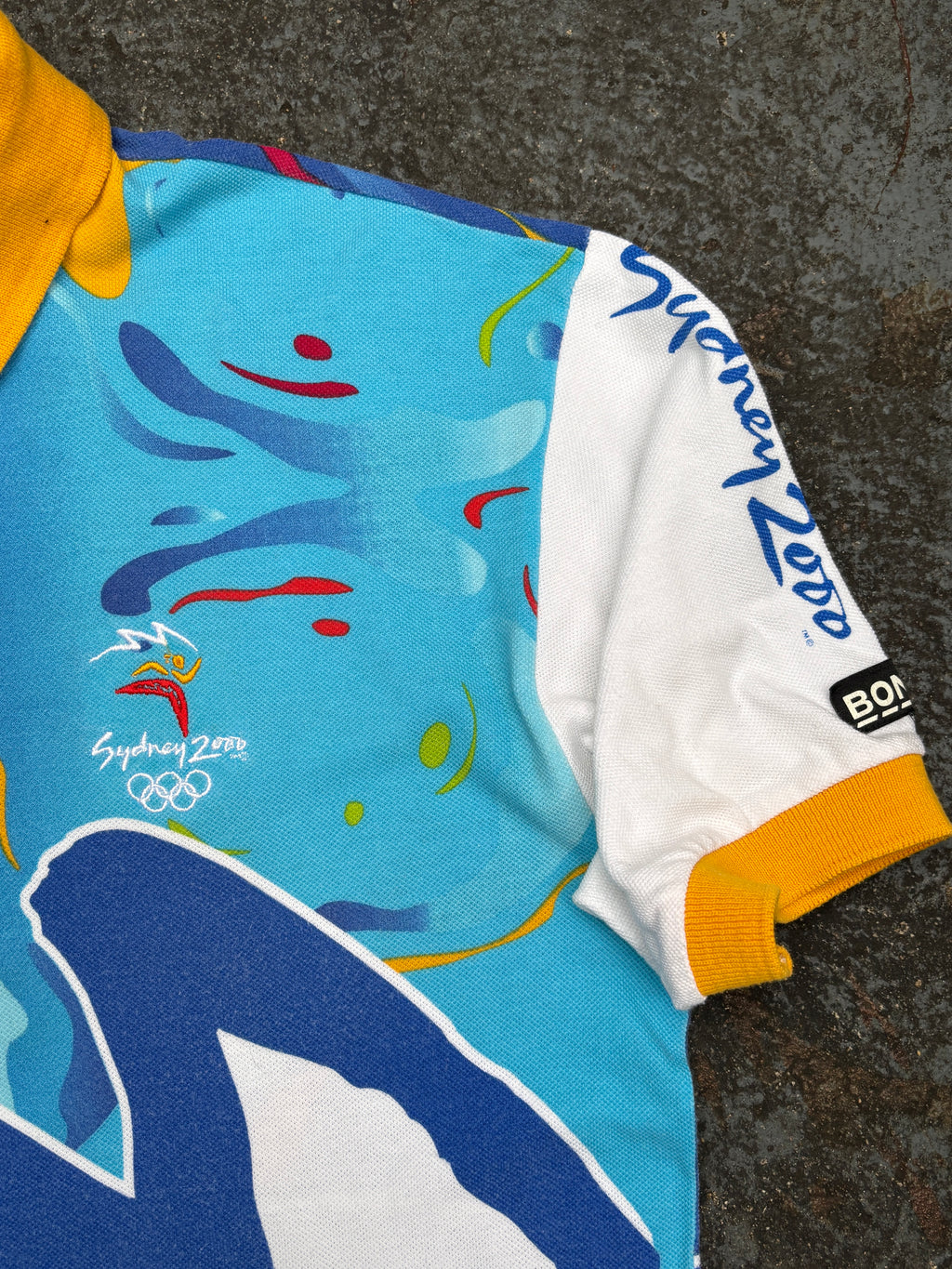 Vintage Y2K Bonds Sydney Olympics Polo Shirt Size M Multi 2000 All Over Graphic