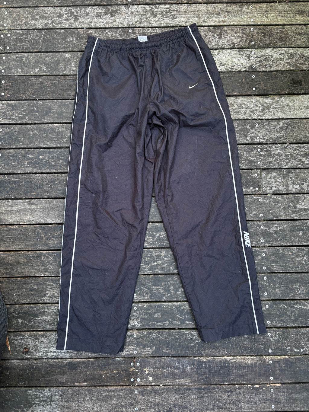 Classic Y2K Nike Track Pants Size L Black w/ Grey Spell Out Logo