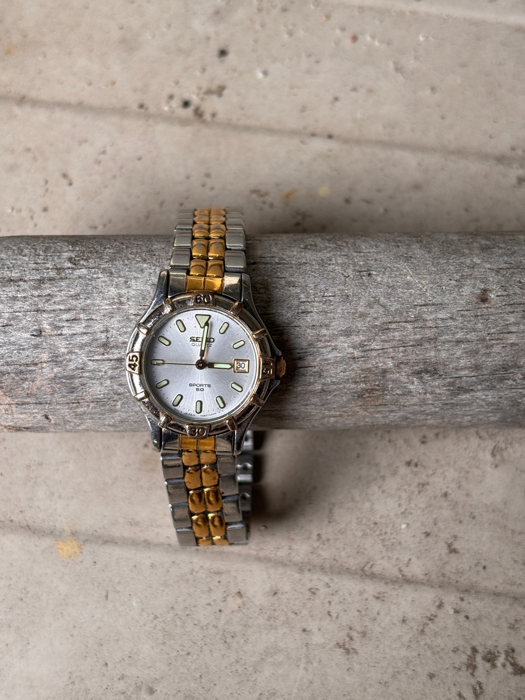 Seiko Sports 50 Ladies Analogue Stainless Steel Gold Tone Watch 7N82-0261