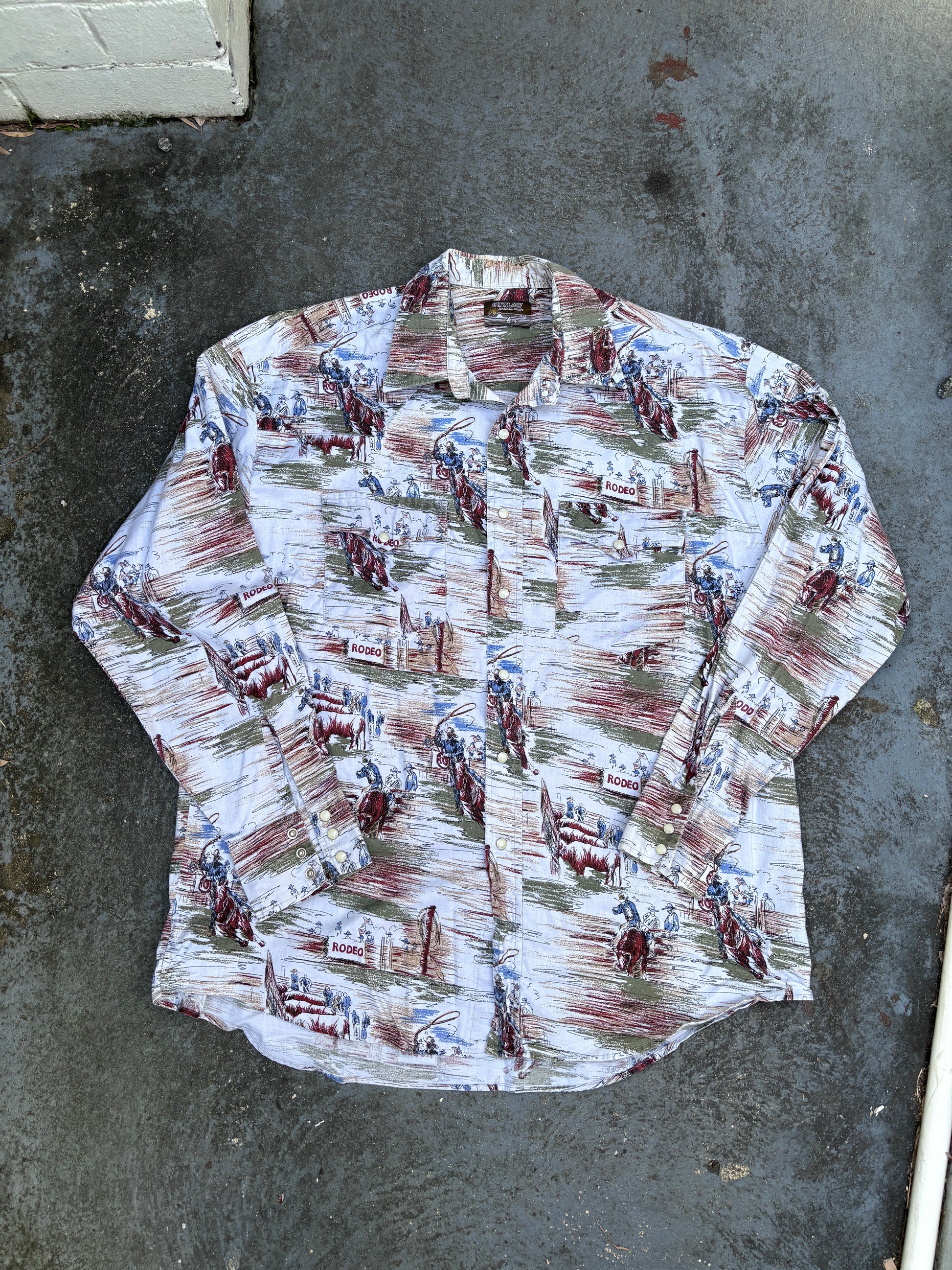 Vintage Outlaw Western Wear Shirt Size XL All Over Rodeo Pattern Pearl Snap Button Up