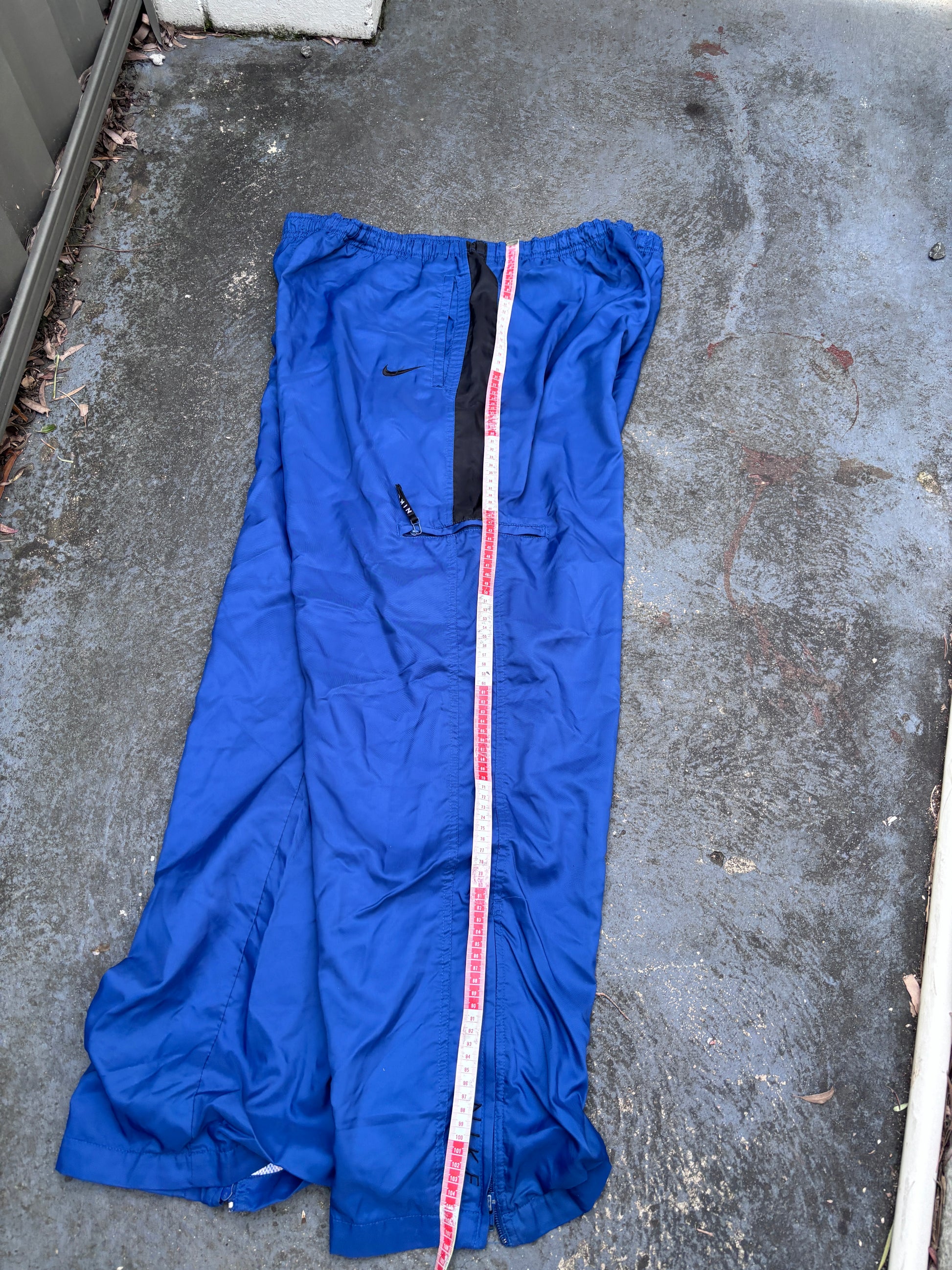 Vintage 90s Nike Track Pants Size XL Blue Black Swoosh Spell Out Logo Classic Windbreakers