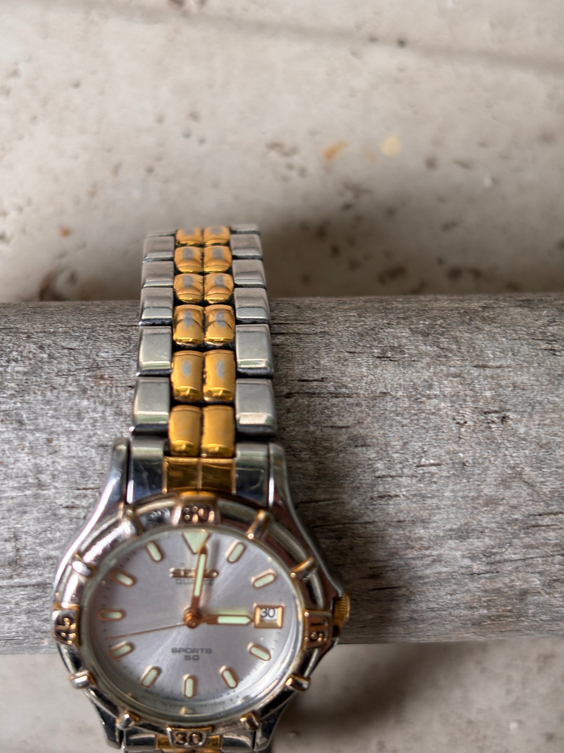Seiko Sports 50 Ladies Analogue Stainless Steel Gold Tone Watch 7N82-0261