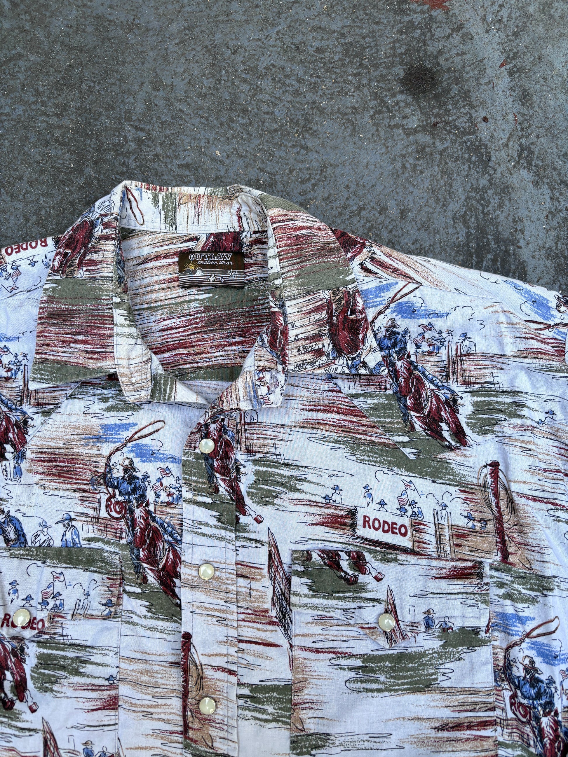 Vintage Outlaw Western Wear Shirt Size XL All Over Rodeo Pattern Pearl Snap Button Up