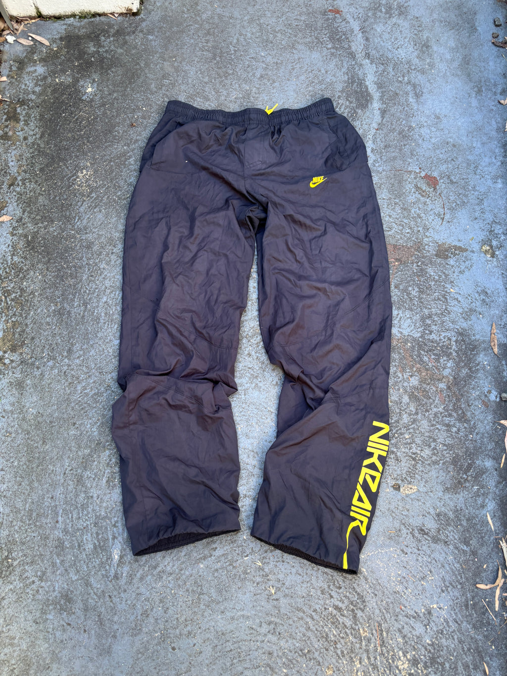 Vintage Y2K Nike Air Track Pants Size M Black Yellow Spell Out Logo Windbreakers