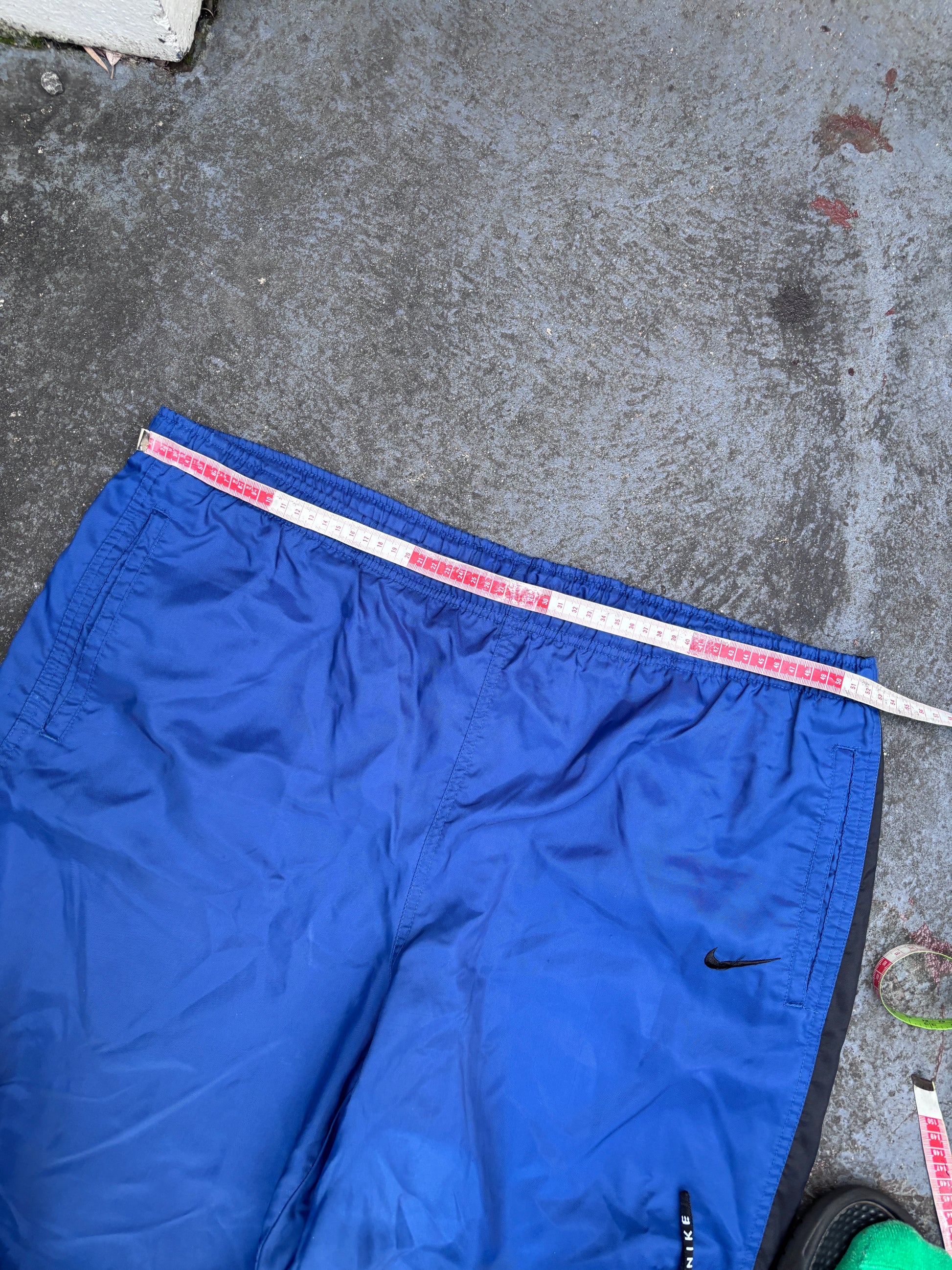 Vintage 90s Nike Track Pants Size XL Blue Black Swoosh Spell Out Logo Classic Windbreakers