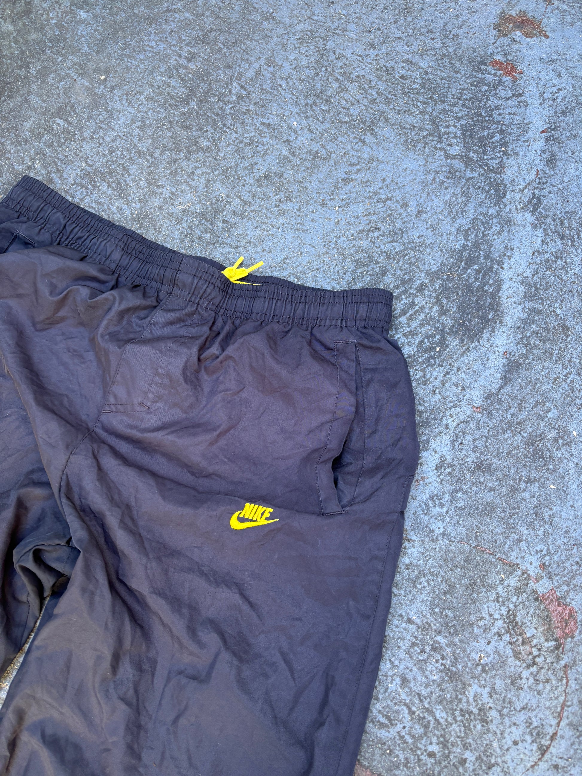 Vintage Y2K Nike Air Track Pants Size M Black Yellow Spell Out Logo Windbreakers