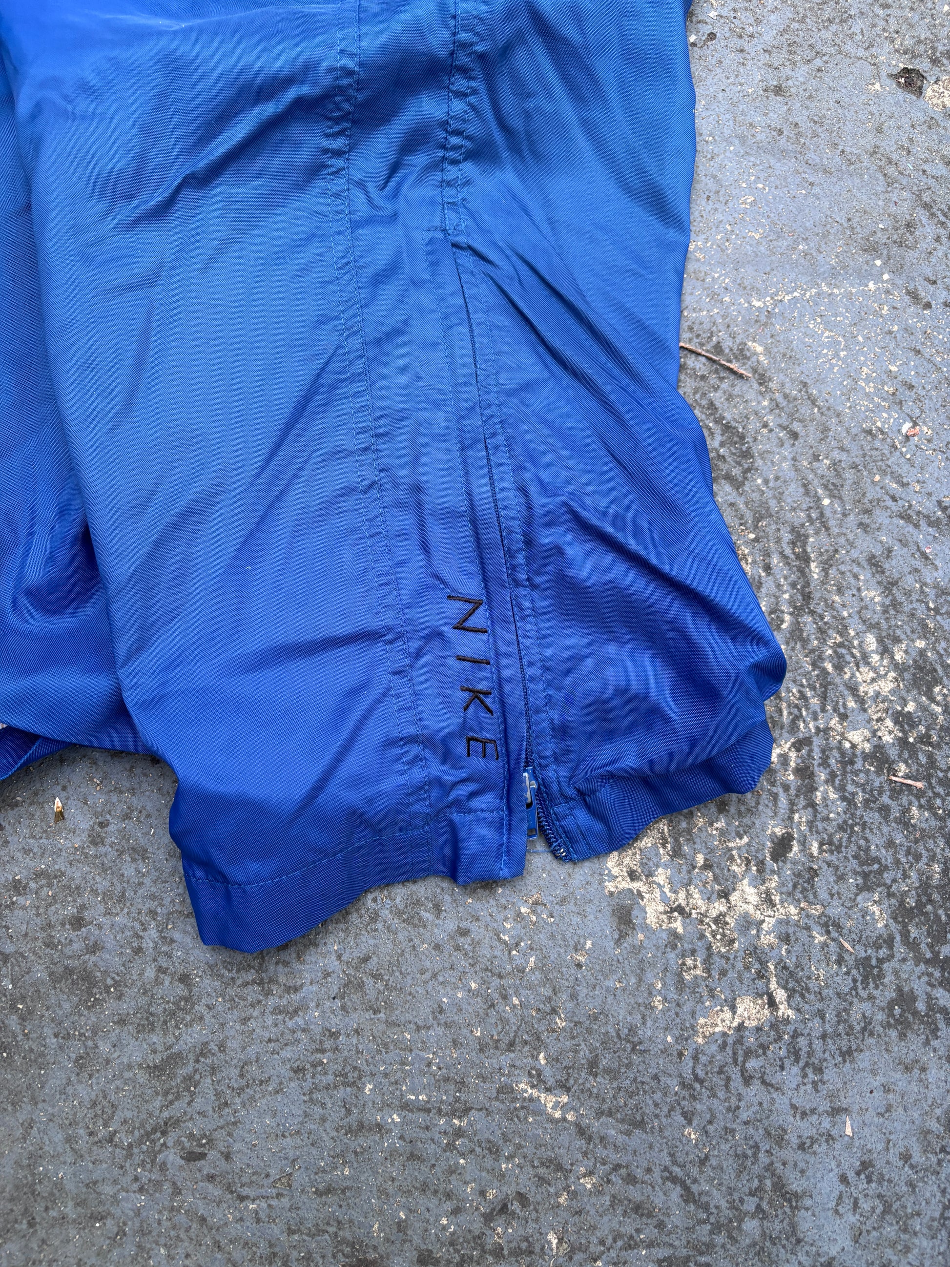 Vintage 90s Nike Track Pants Size XL Blue Black Swoosh Spell Out Logo Classic Windbreakers