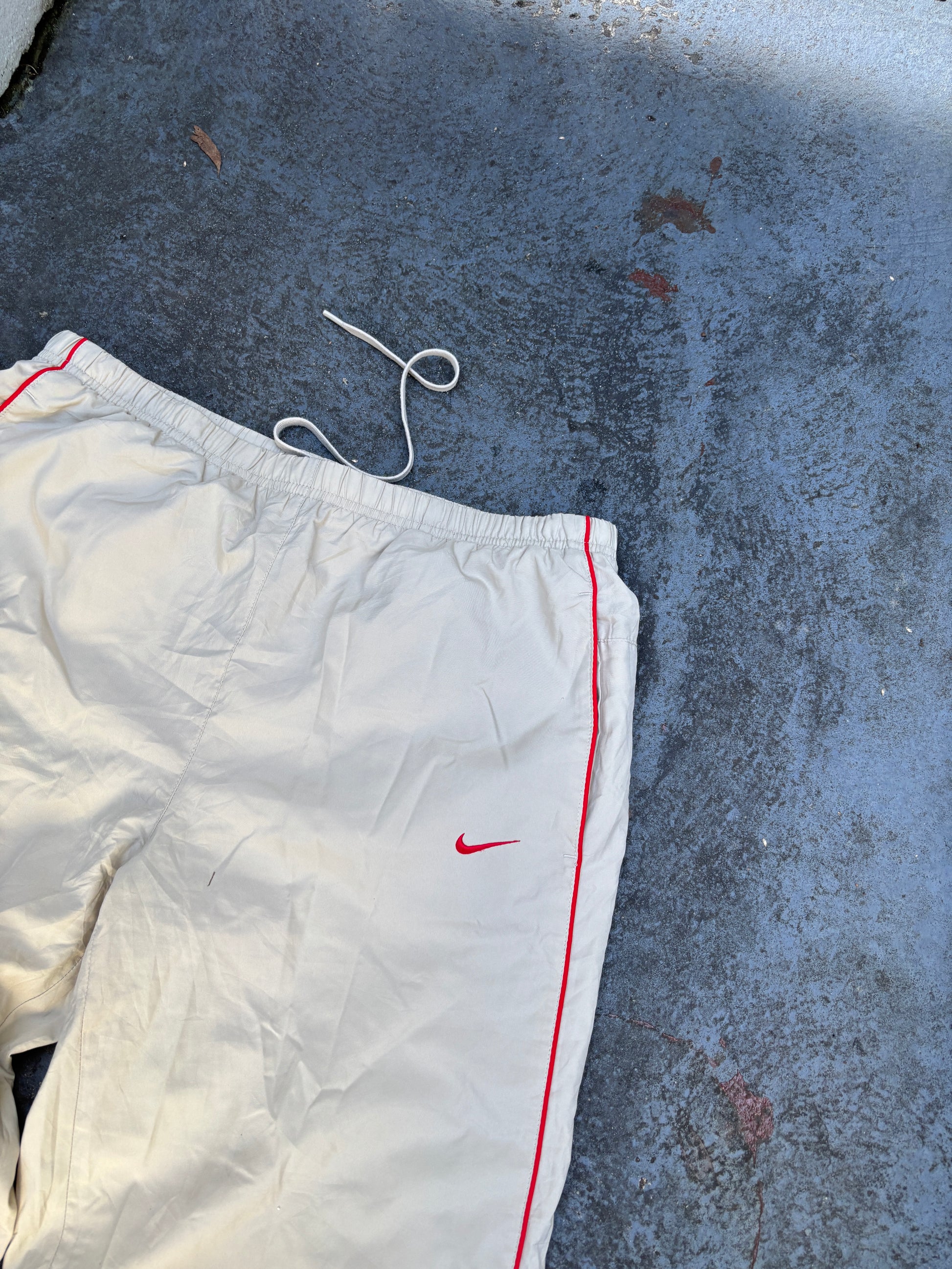 Vintage Y2K Nike Track Pants Size M Beige Red Detail Swoosh Classic Nylon Windbreakers