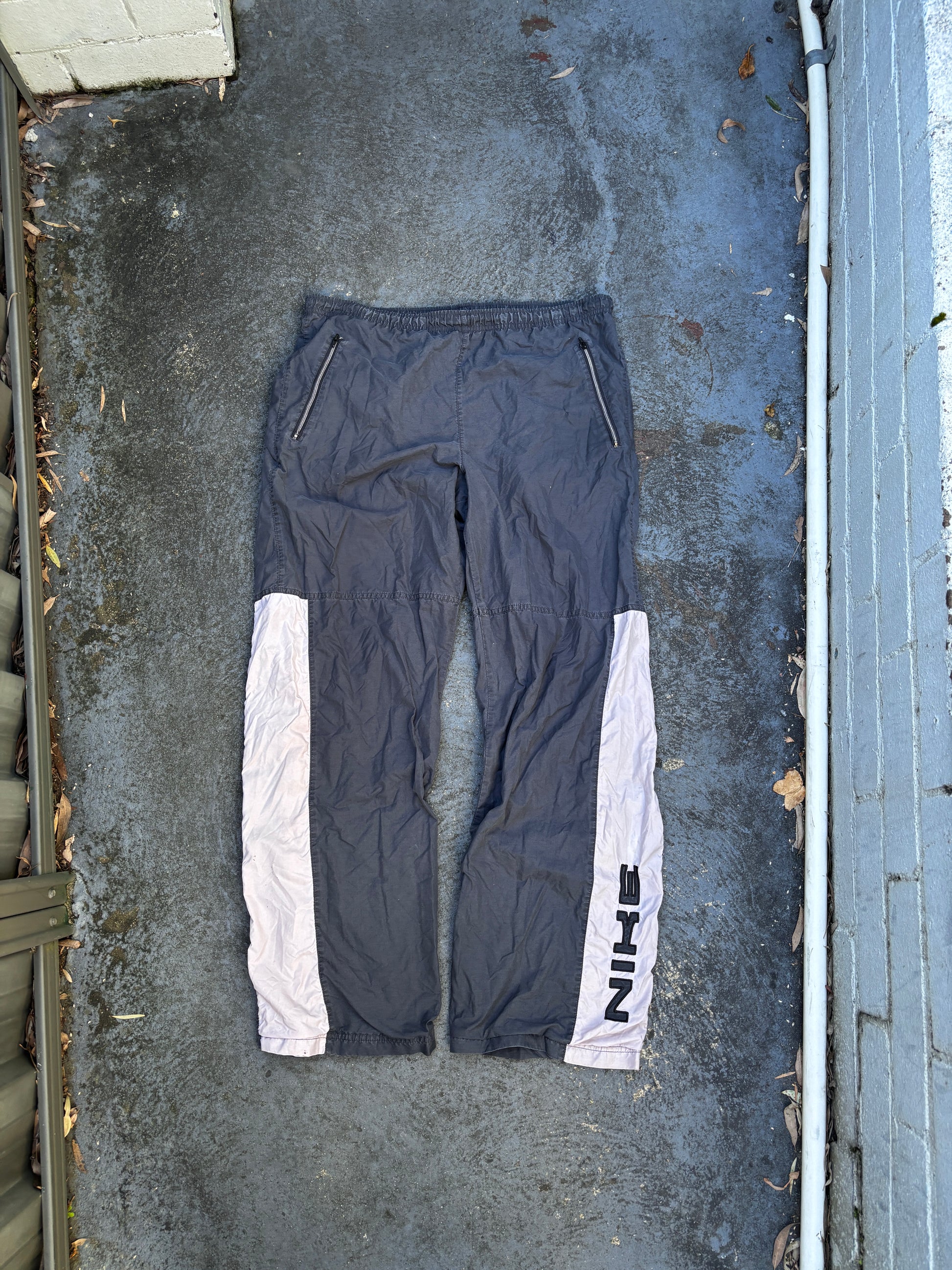 Vintage Y2K Nike Track Pants Size M Grey Beige Detail Spell Out Logo Windbreaker