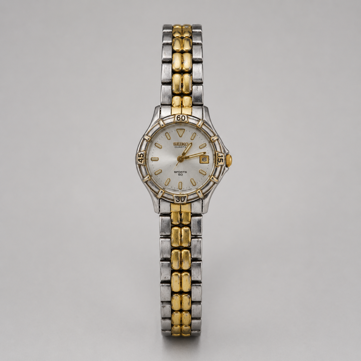Seiko Sports 50 Ladies Analogue Stainless Steel Gold Tone Watch 7N82-0261