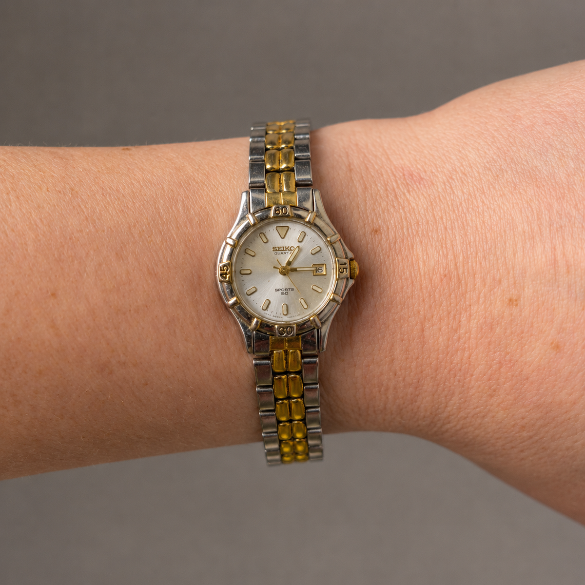 Seiko Sports 50 Ladies Analogue Stainless Steel Gold Tone Watch 7N82-0261