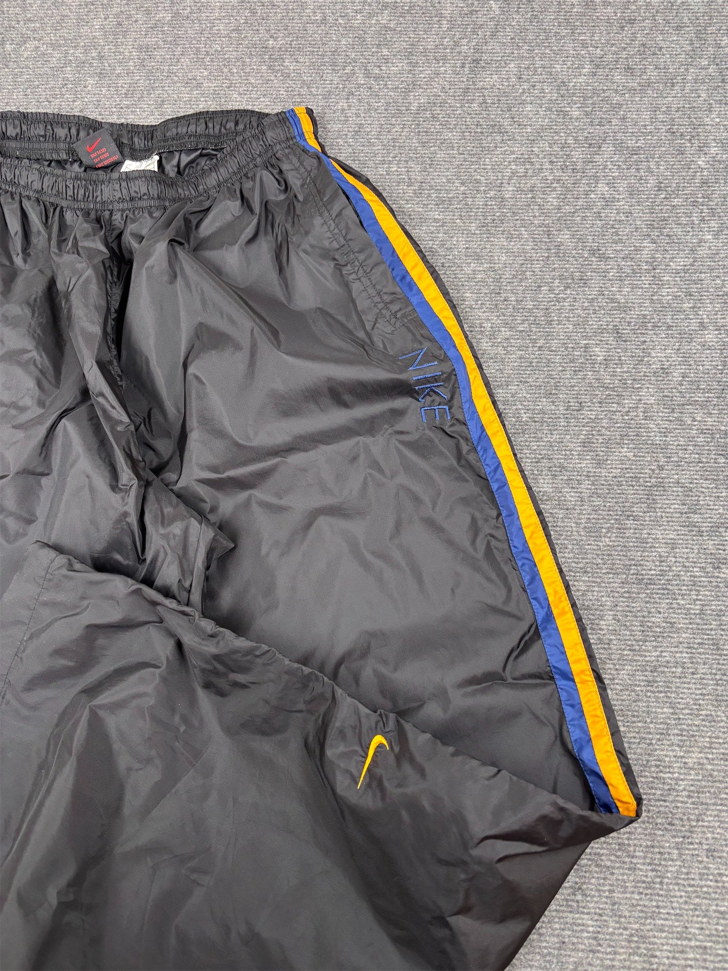 Vintage 90s Nike Track Pants Size L Black Yellow Detail Spell Out Super Wide Leg