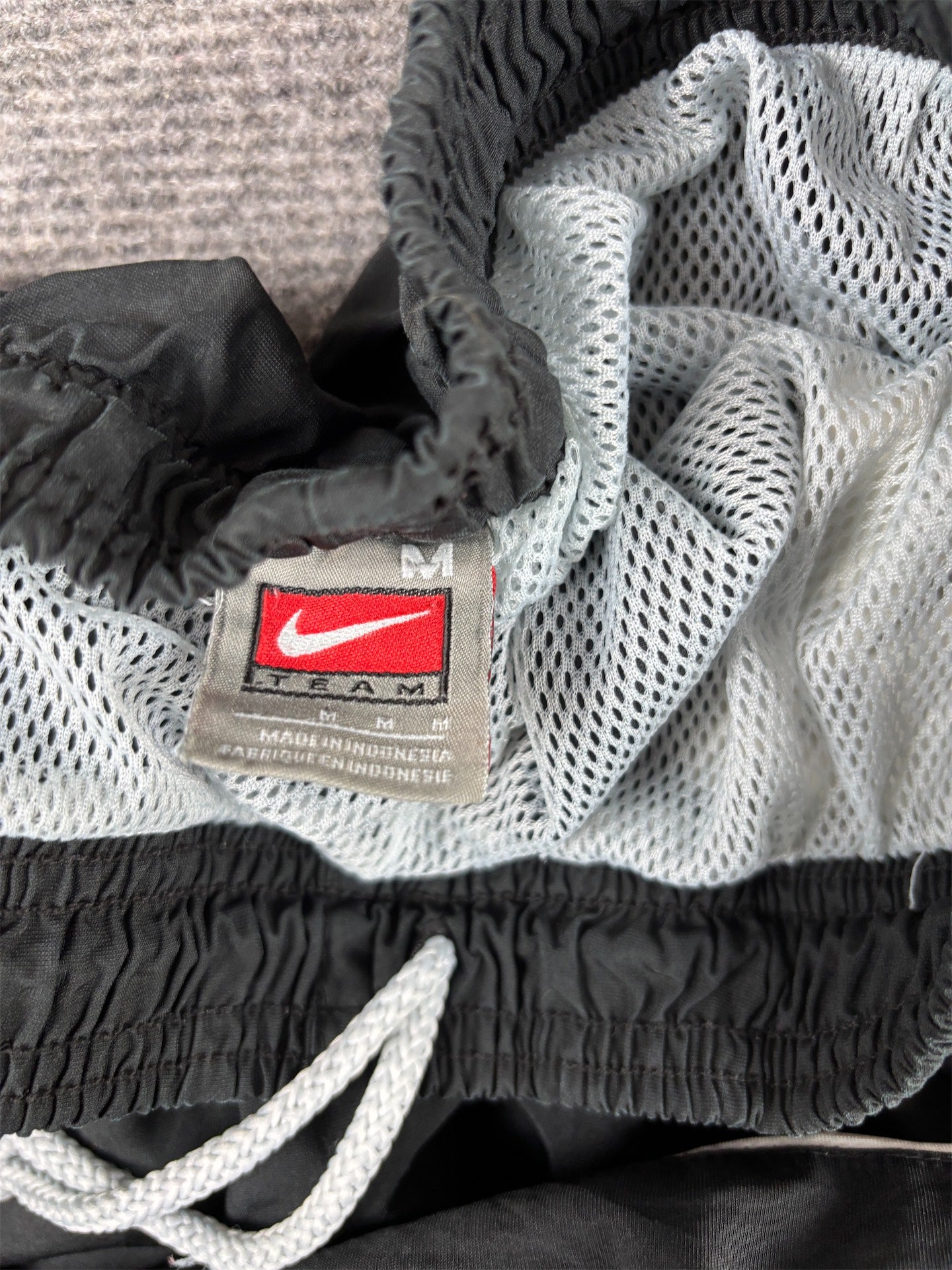 Vintage Y2K Nike Team Track Pants Size M Black White Panels Swoosh Ankle Zip Baggy