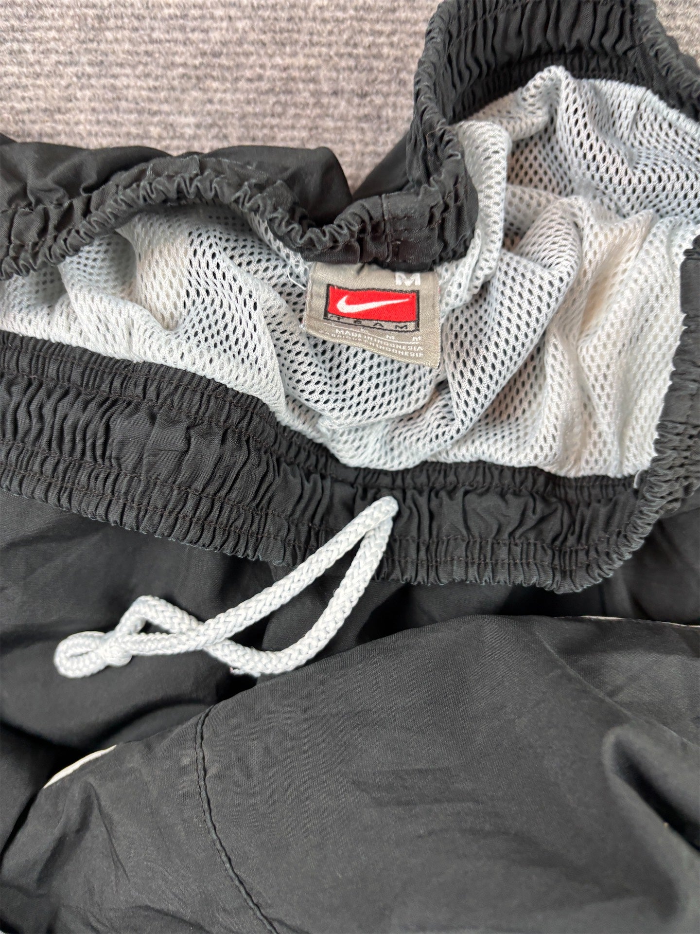 Vintage Y2K Nike Team Track Pants Size M Black White Panels Swoosh Ankle Zip Baggy