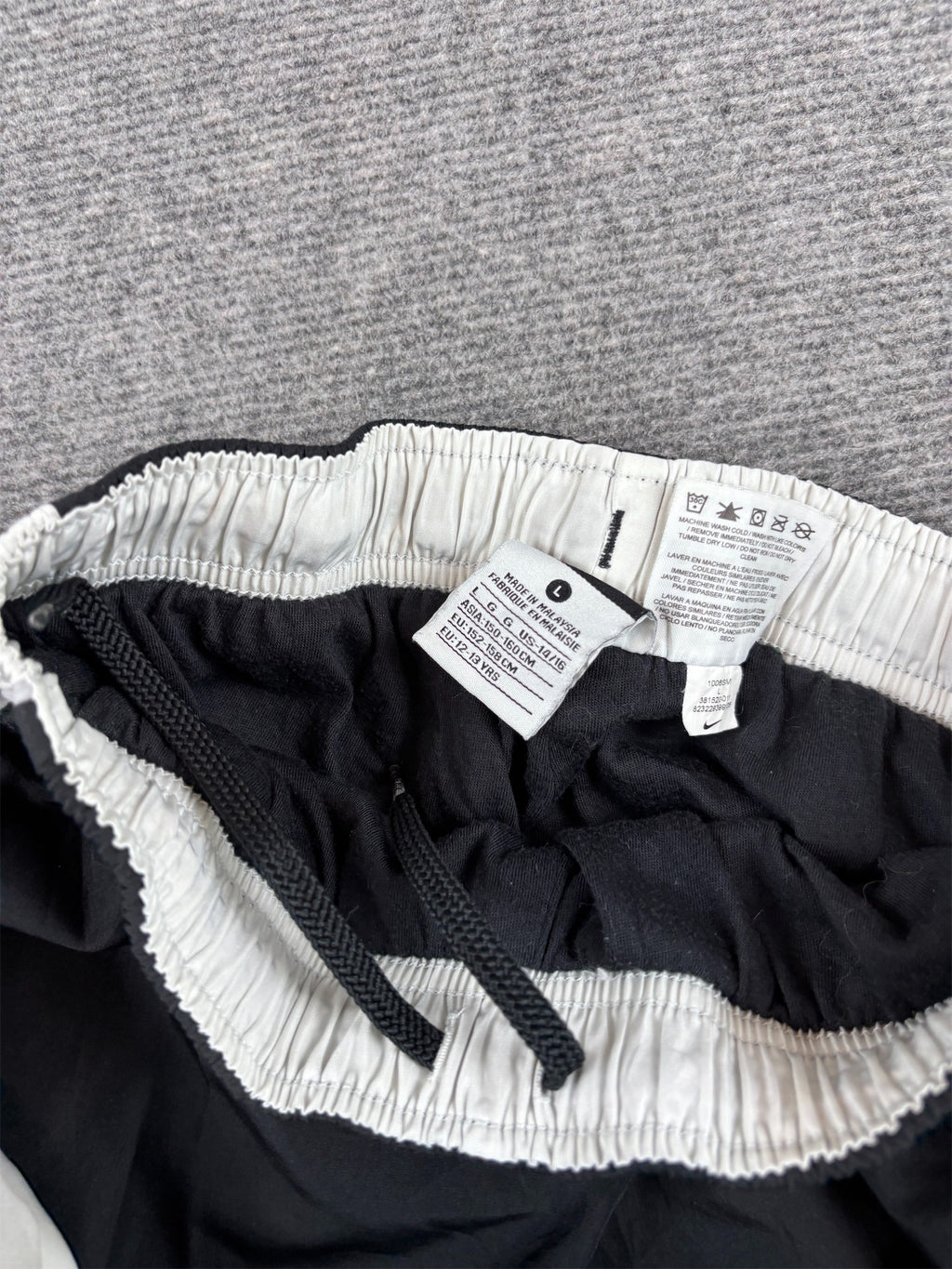 Nike Track Pants Women XXS Black White Panels Hip Swoosh Ankle Zip Wide Straight Leg