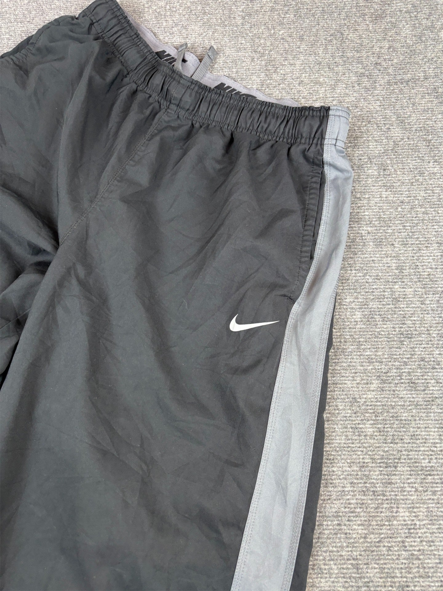 Nike Dri-Fit Track Pants L Black Printed Grey Swoosh Side Panels Baggy Fit