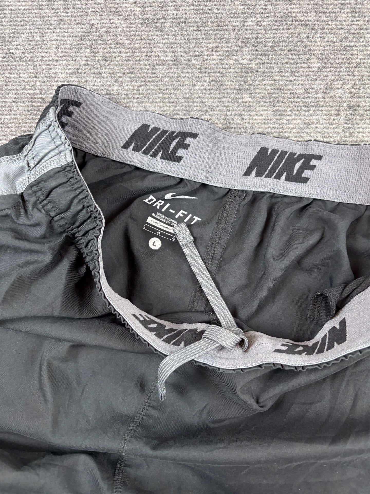 Nike Dri-Fit Track Pants L Black Printed Grey Swoosh Side Panels Baggy Fit