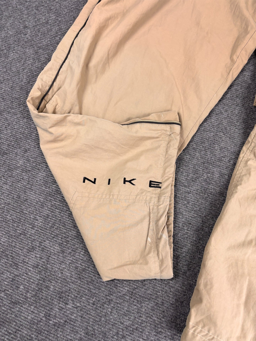 Vintage 90's Nike Track Pants Men's XL Beige Black Grey Swoosh Piping Spell Out Logo Ankle Zips Wide Leg