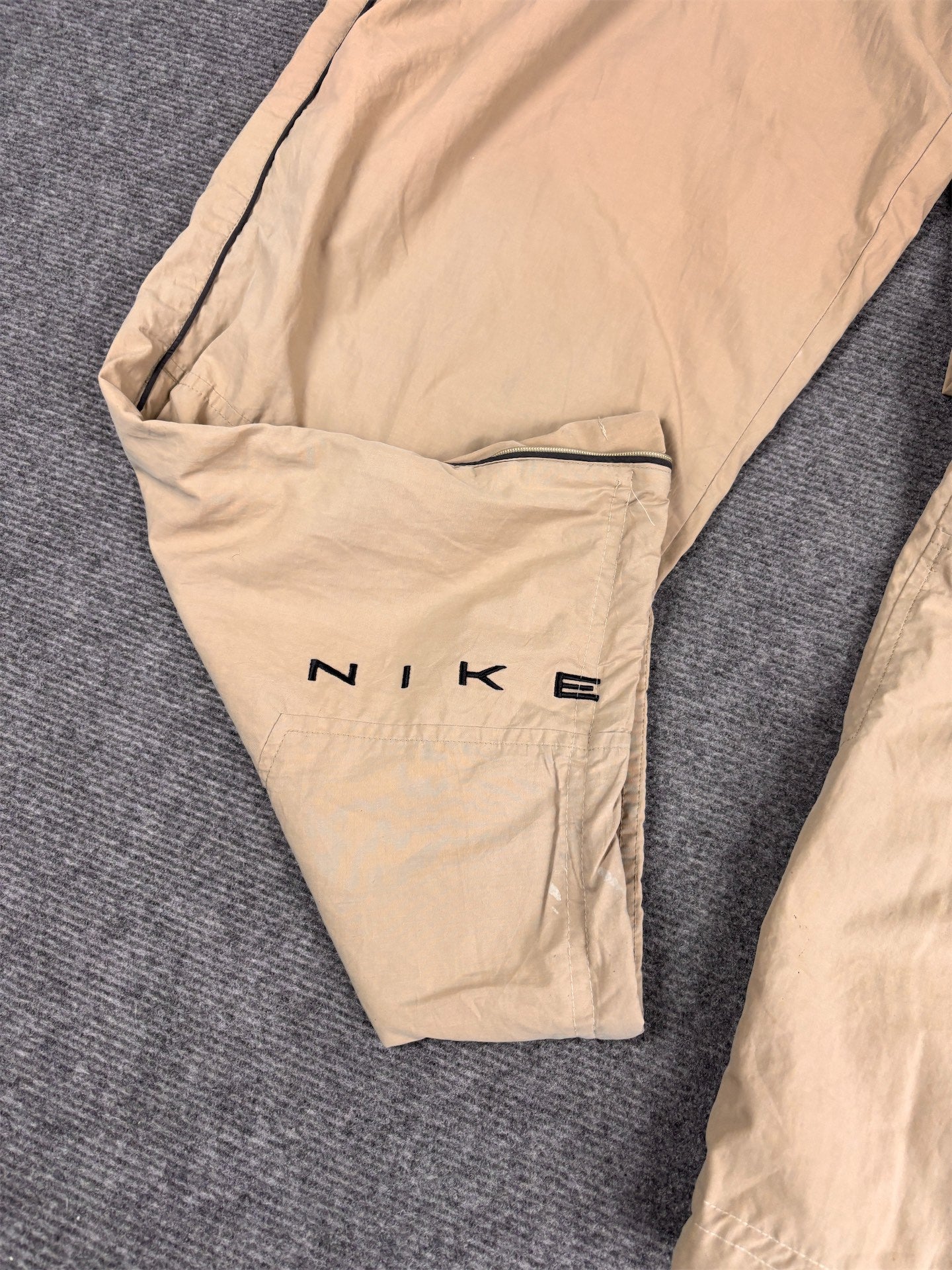 Vintage 90's Nike Track Pants Men's XL Beige Black Grey Swoosh Piping Spell Out Logo Ankle Zips Wide Leg
