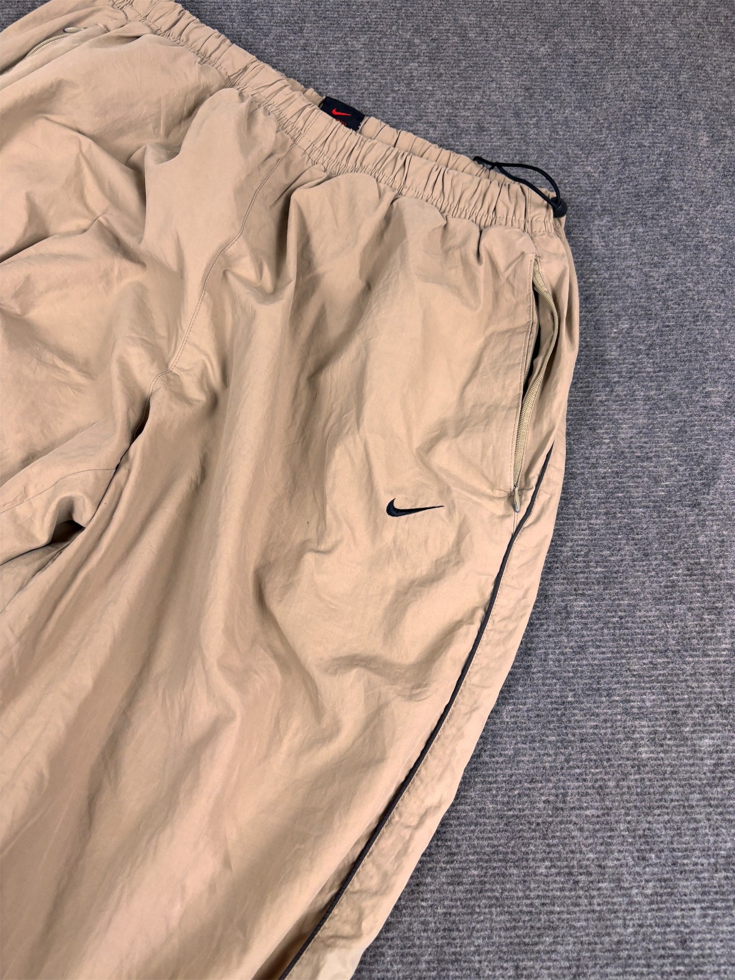 Vintage 90's Nike Track Pants Men's XL Beige Black Grey Swoosh Piping Spell Out Logo Ankle Zips Wide Leg