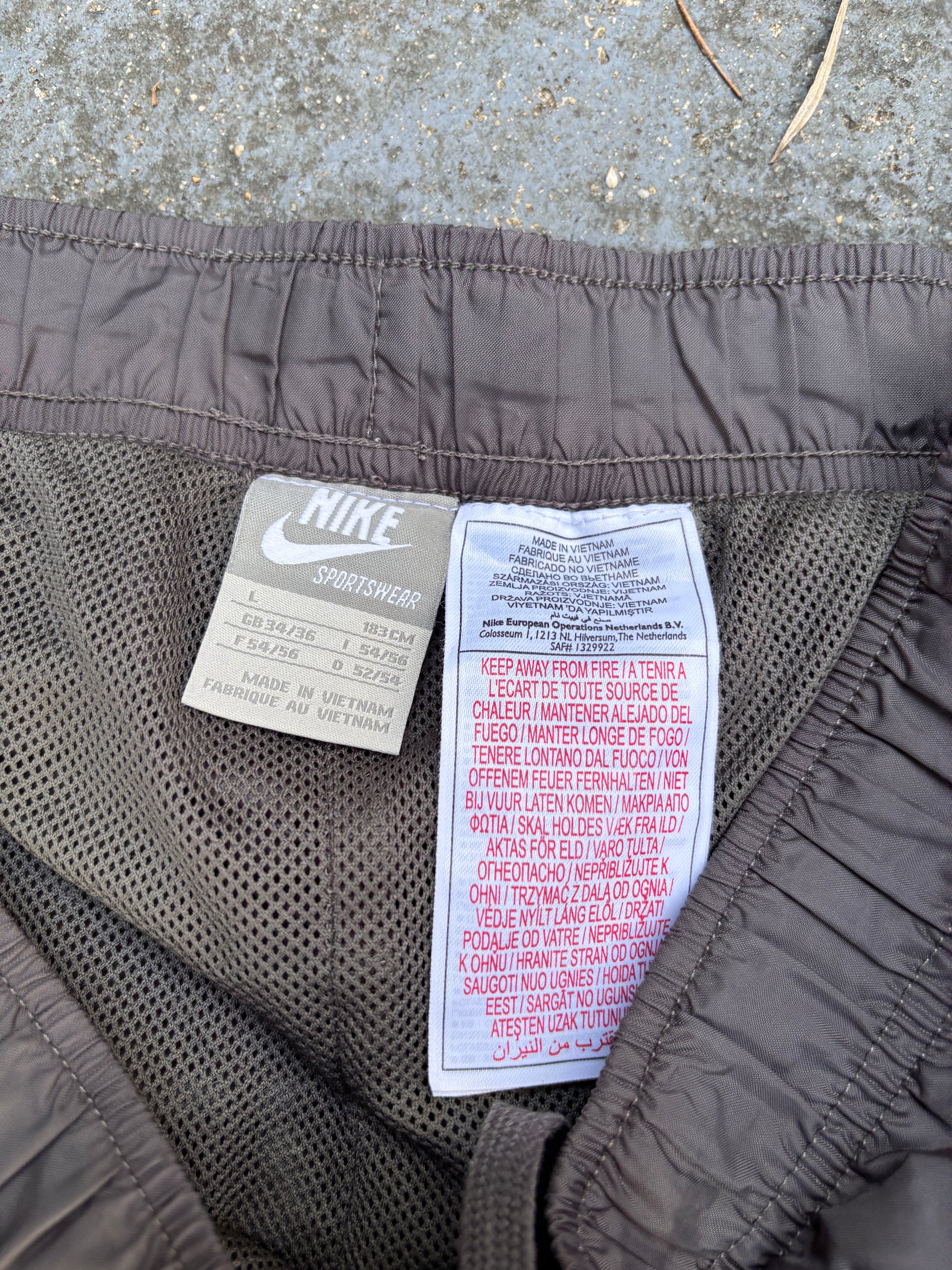 Vintage Y2K Nike Track Pants Size L Grey White Detail Classic Nylon Windbreaker