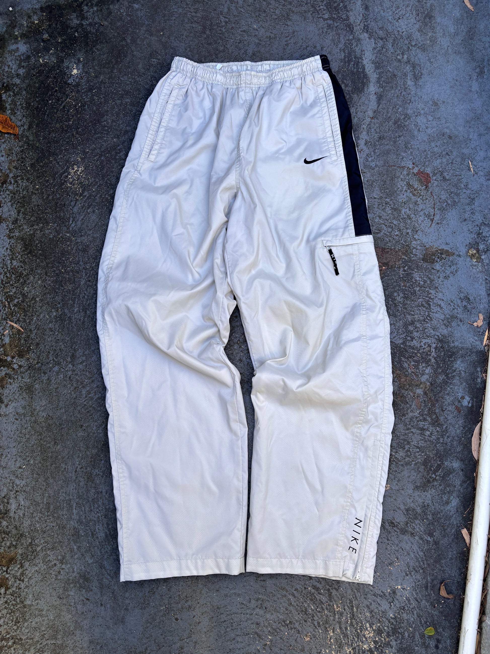 Vintage 90s Nike Track Pants Size M Cream Black Detail Spell Out Logo Nylon Windbreakers