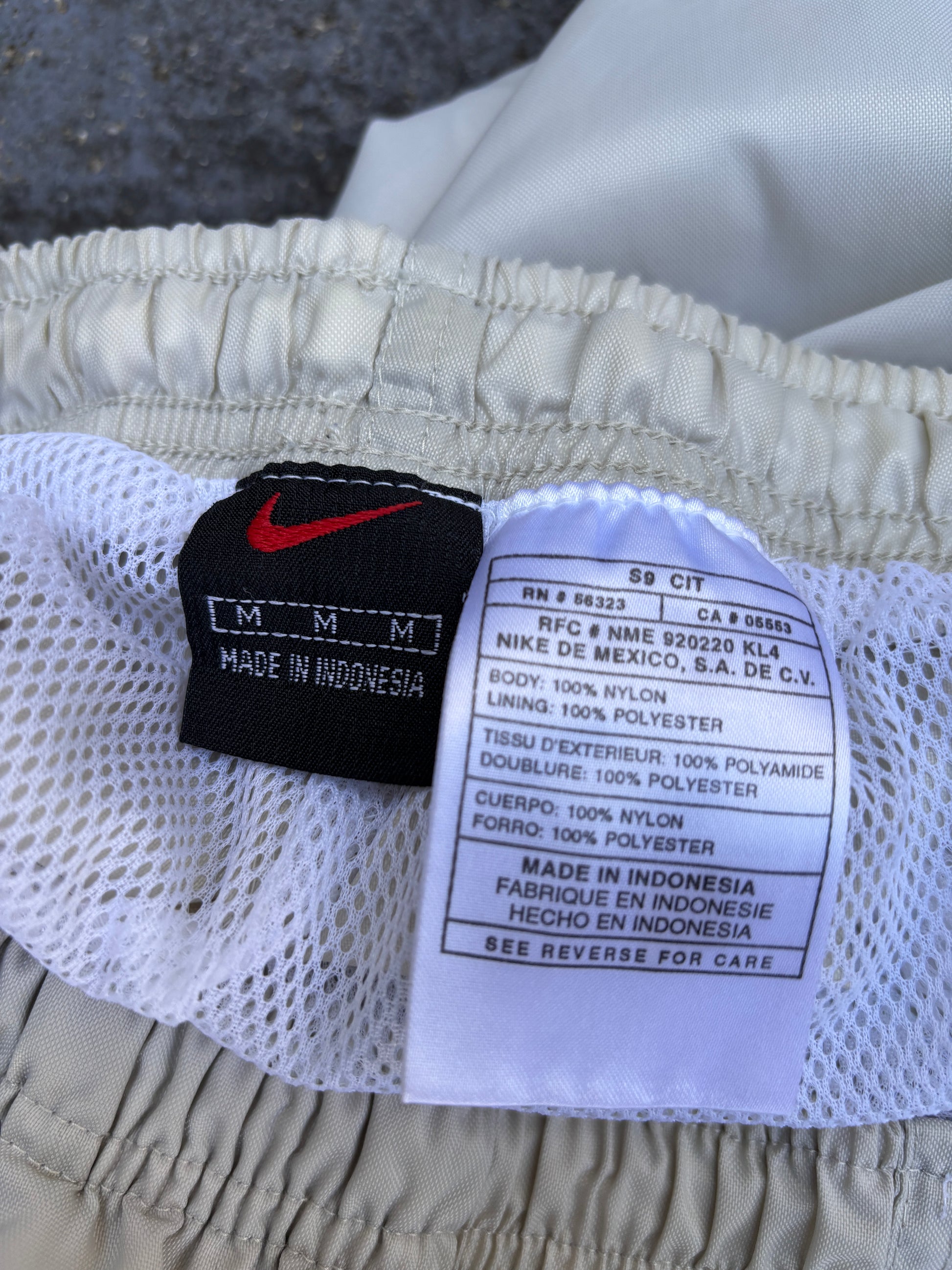 Vintage 90s Nike Track Pants Size M Cream Black Detail Spell Out Logo Nylon Windbreakers