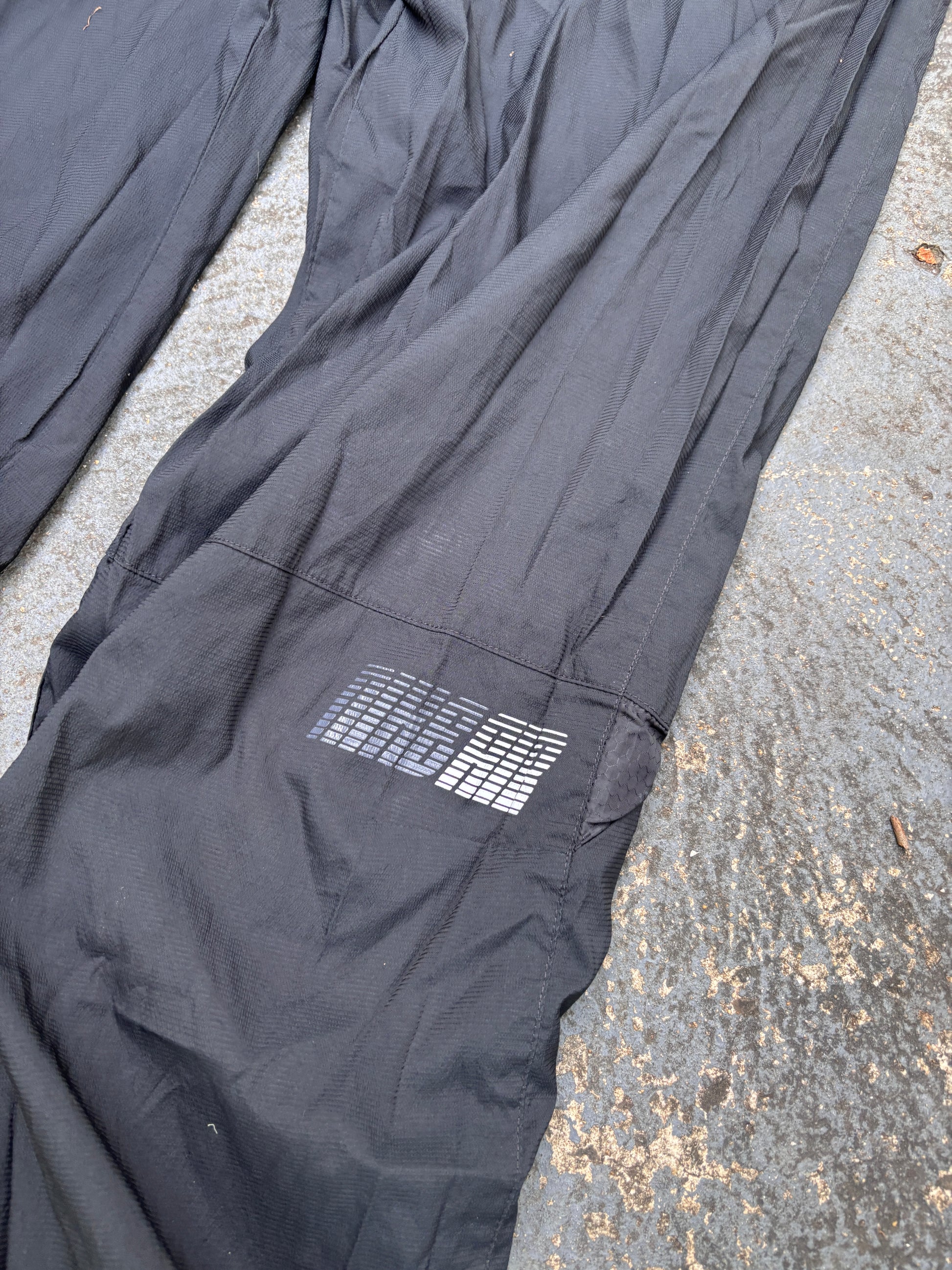 Vintage Y2K Nike Track Pants Fits L/XL Black Blue Nike Air Spell Out Bungee Tabs Nylon