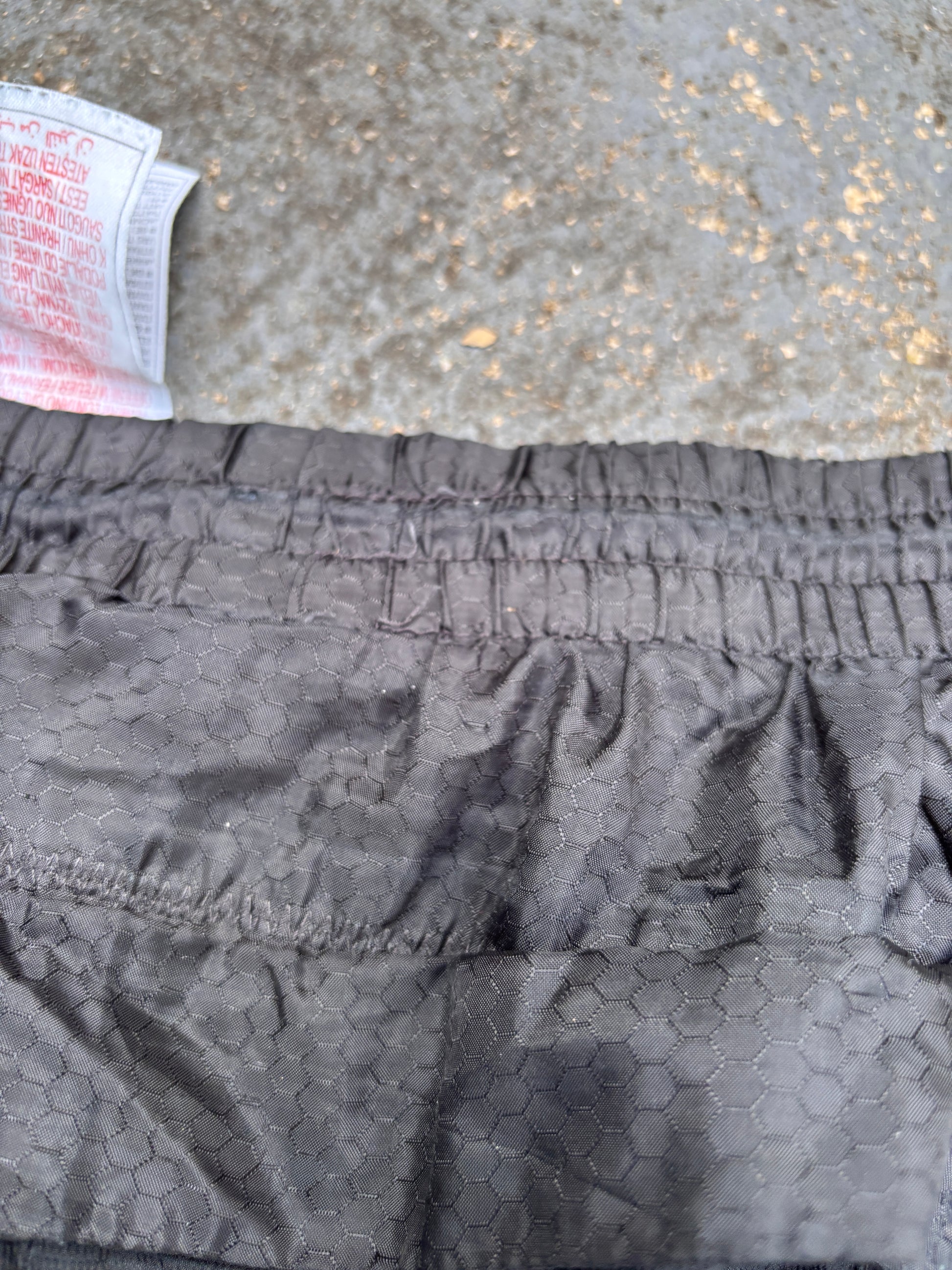 Vintage Y2K Nike Track Pants Fits L/XL Black Blue Nike Air Spell Out Bungee Tabs Nylon