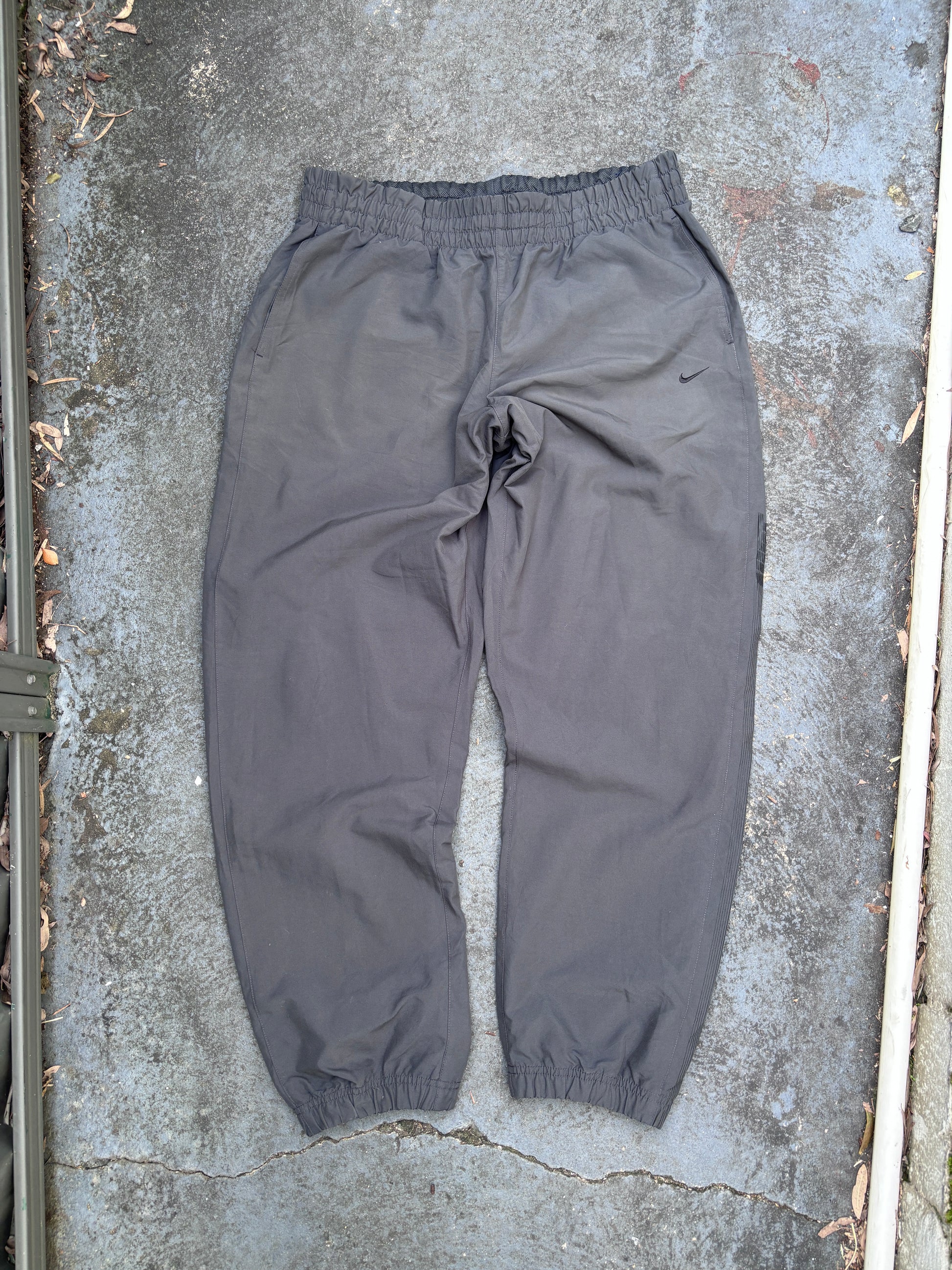 Vintage Y2K Nike Track Pants Tagged XXL Grey Black Detail Spell Out Windbreakers