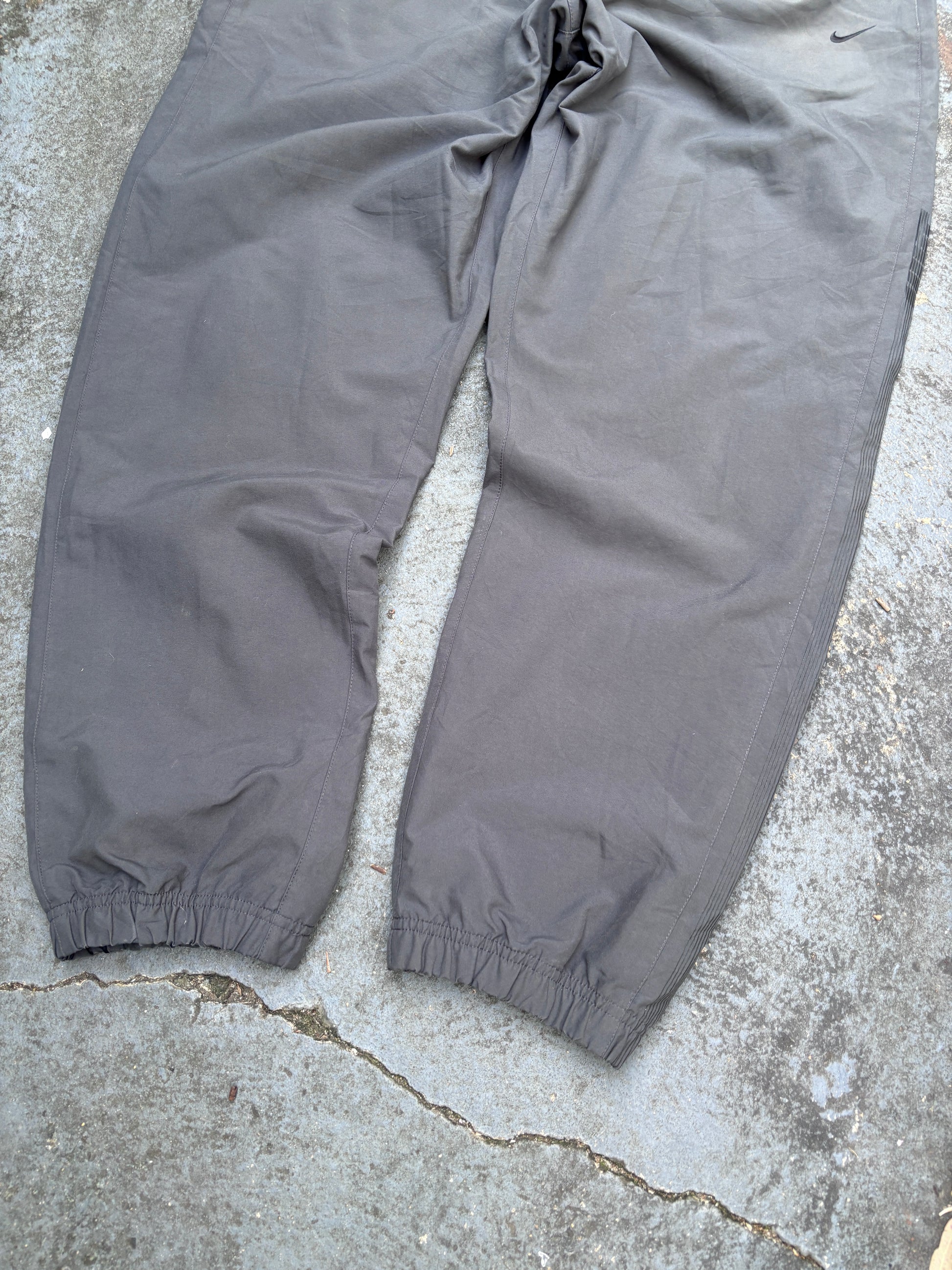 Vintage Y2K Nike Track Pants Tagged XXL Grey Black Detail Spell Out Windbreakers