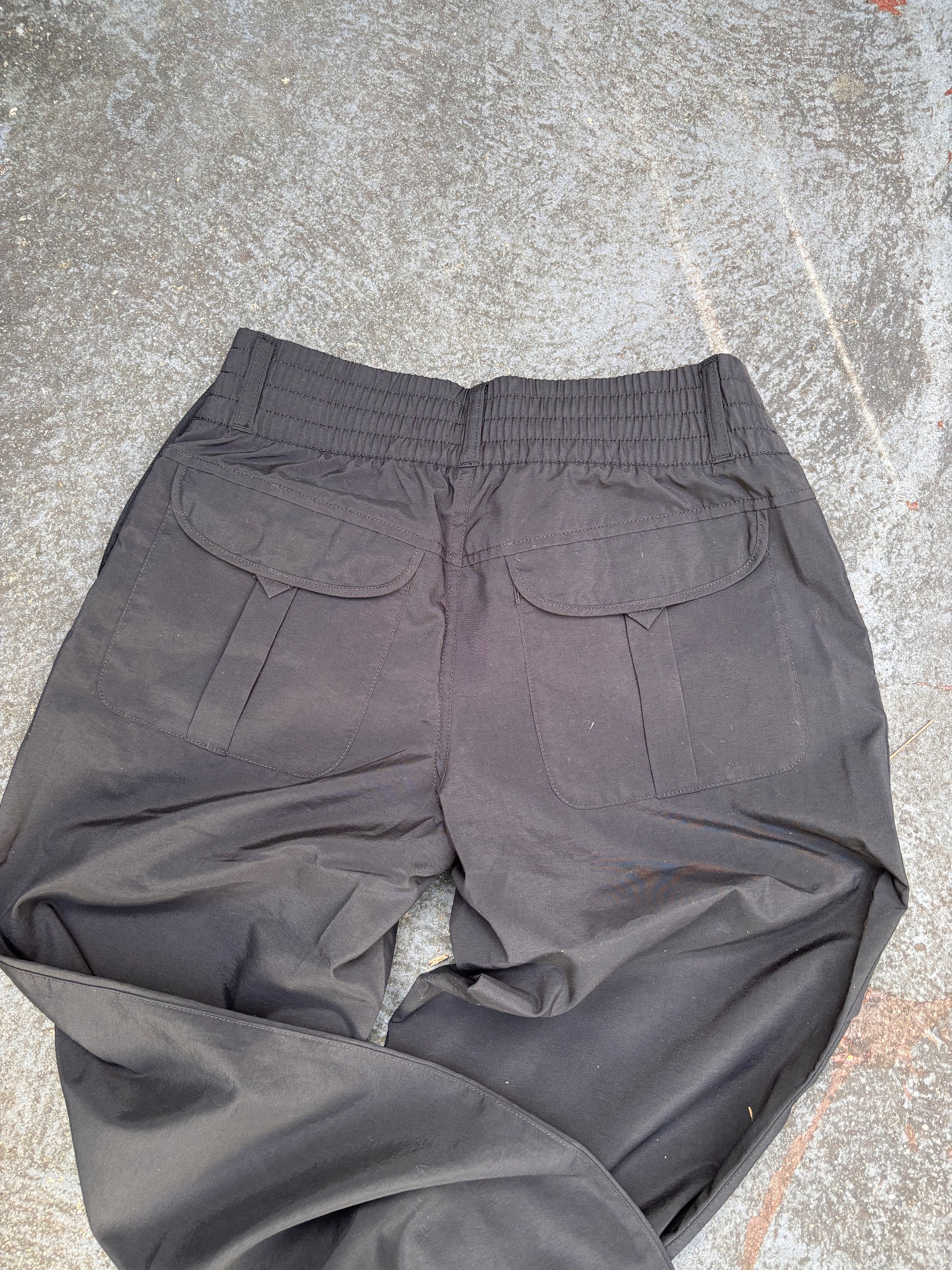 Nike ACG Pants Womens S Black Ankle Logo Wide Leg Windbreaker Chinos NWT