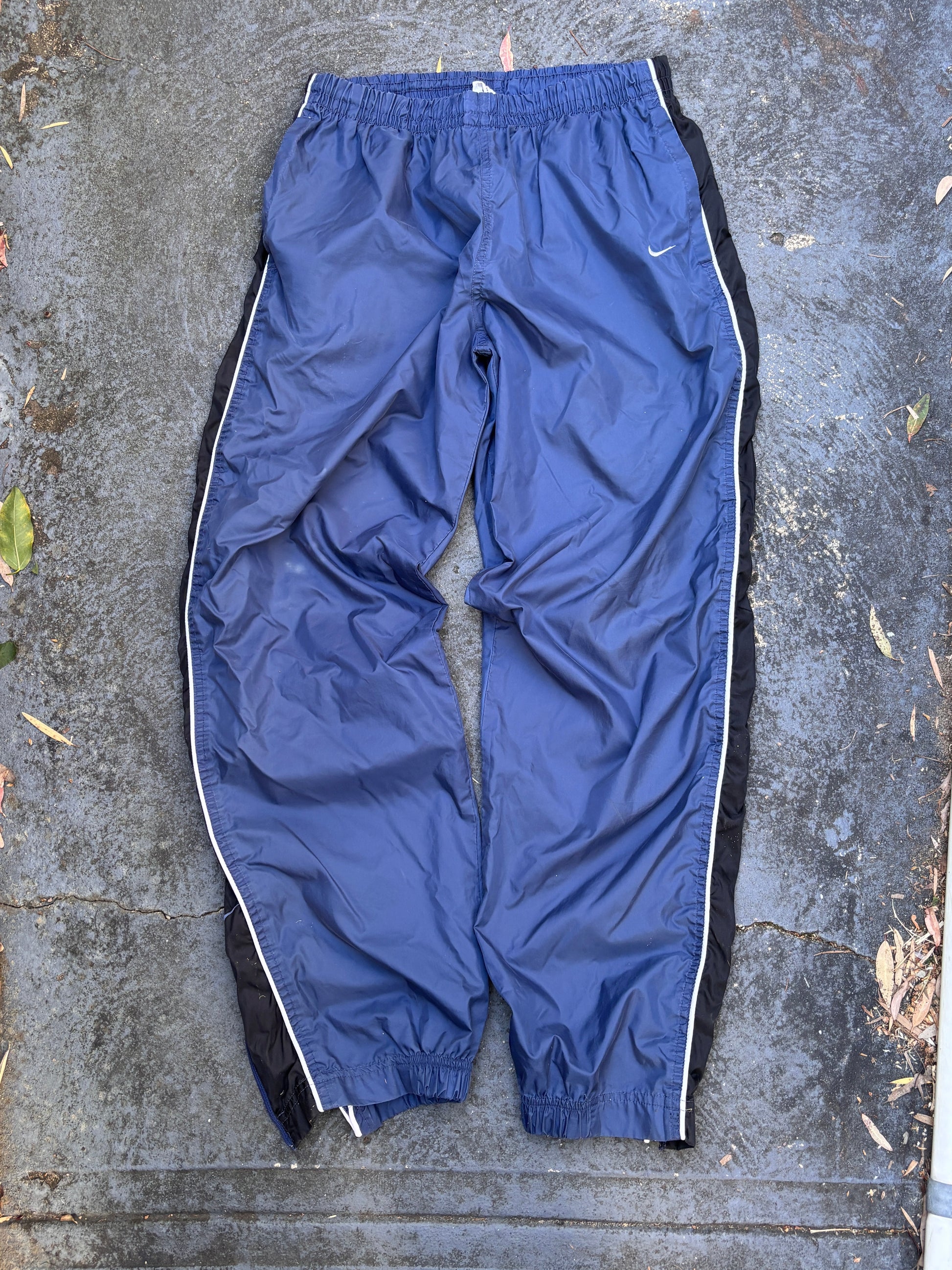Vintage 90s Nike Track Pants Size L Blue Black Detail Spell Out Swoosh Wide Leg Ankle Zip