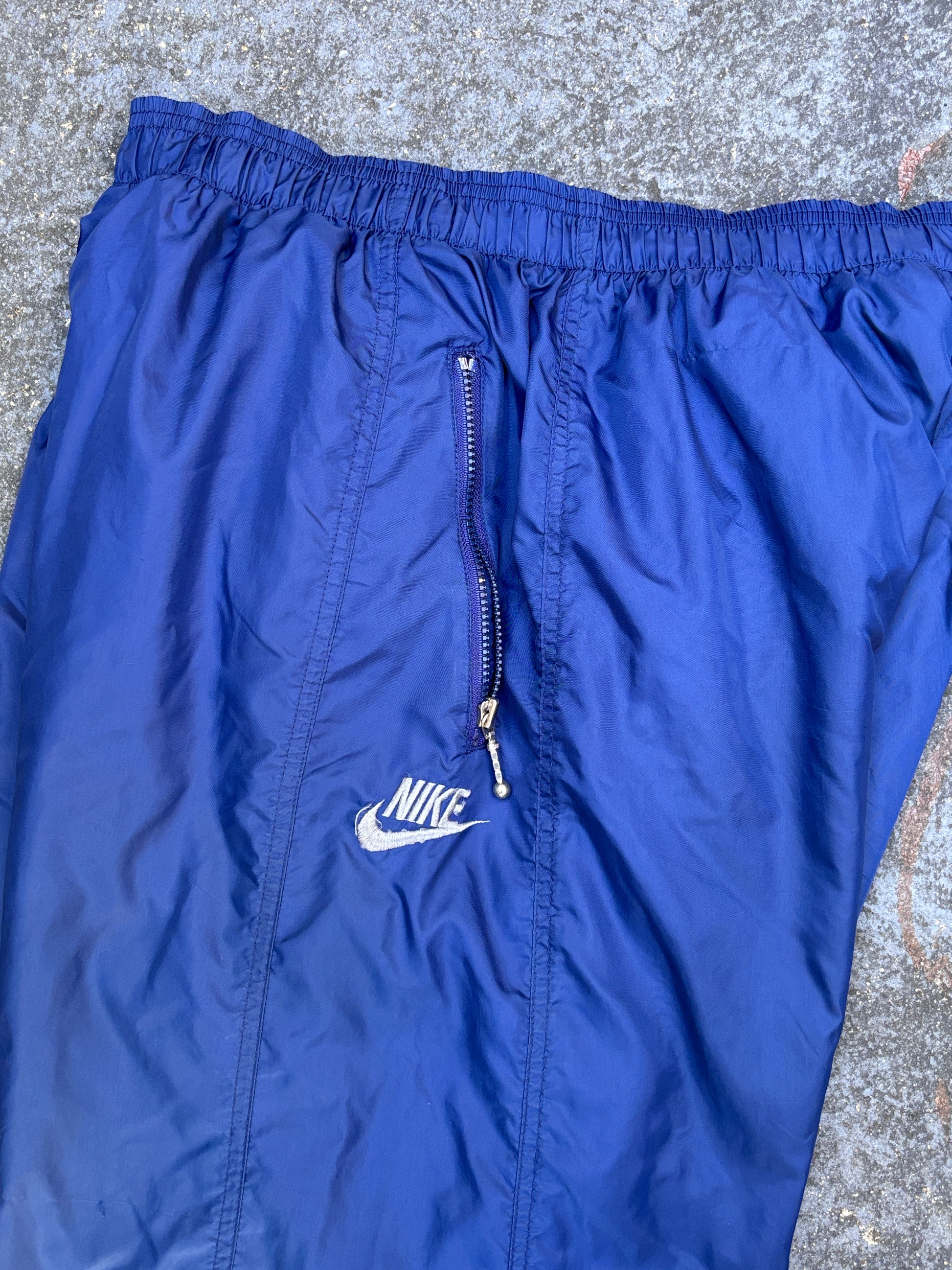 Vintage 90s Nike Track Pants Size L Navy Embroidered Logo Wide Leg Ankle Zip