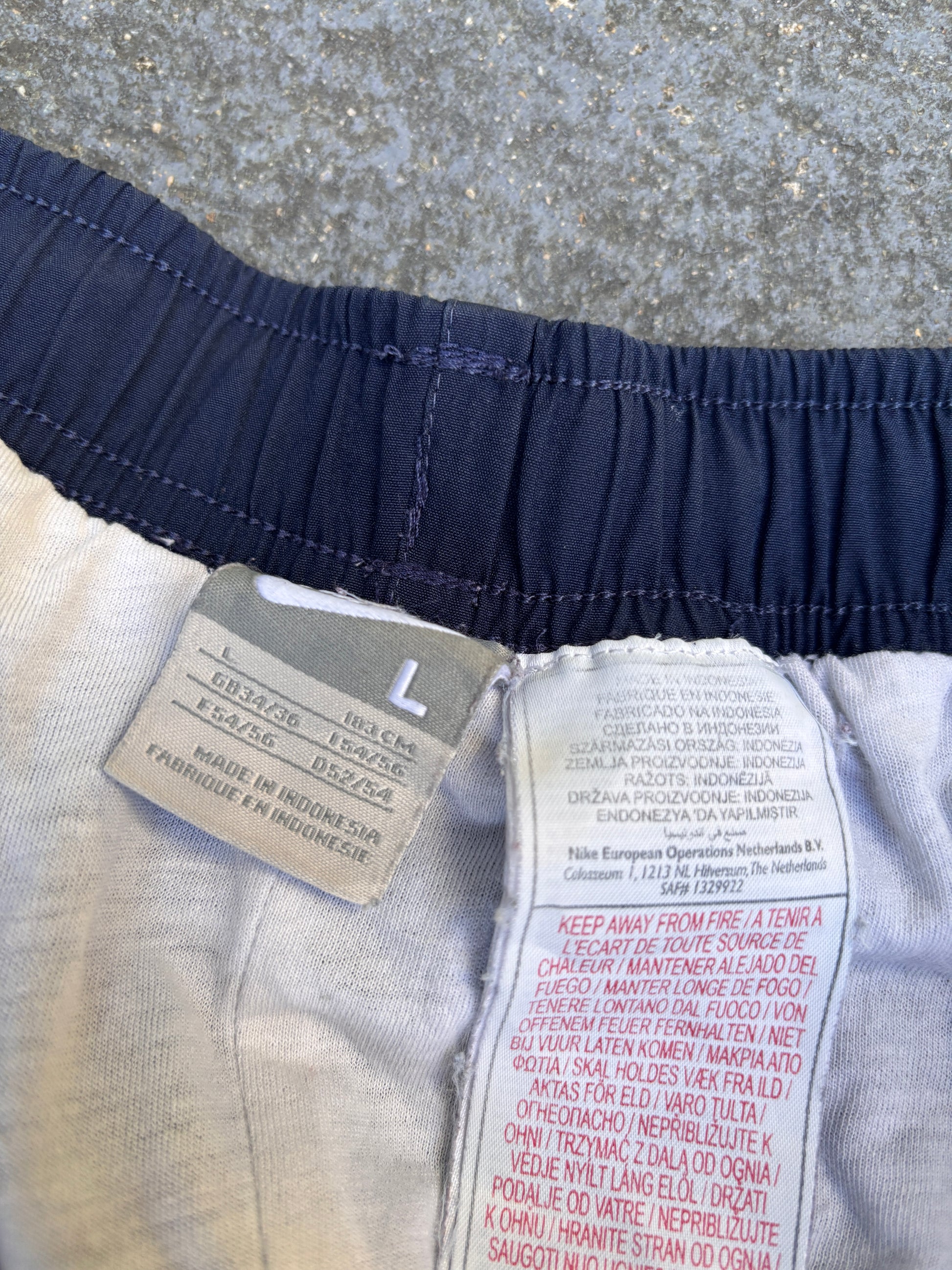 Vintage Y2K Nike Track Pants Size L Navy White Piping Double Spell Out Wide Leg Ankle Zip