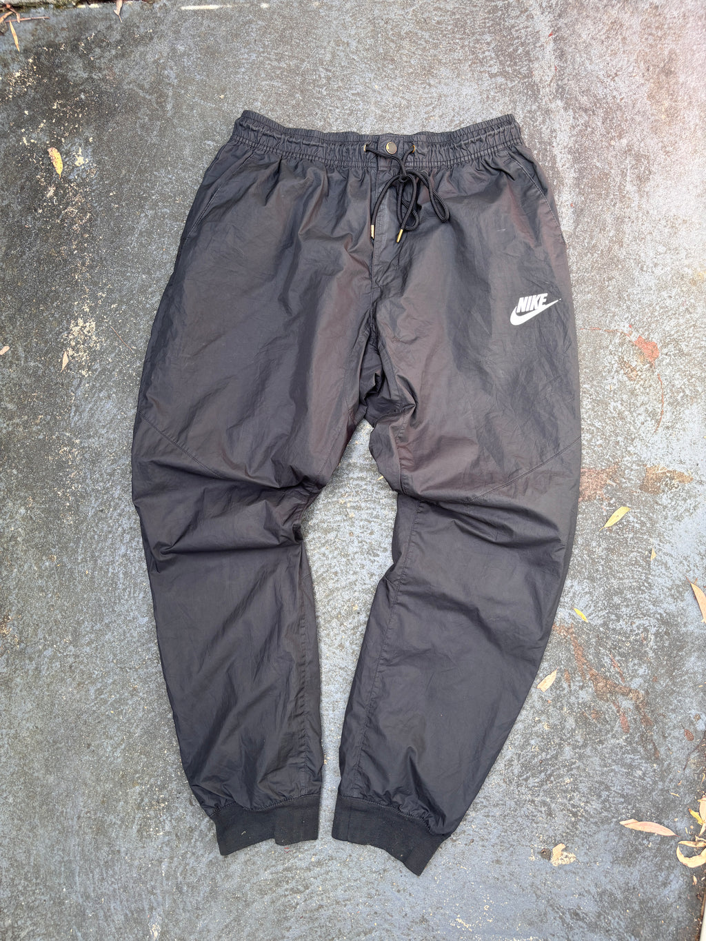 Nike Track Pants Women’s Size L Black Hip Logo Tapered Button Zip Drawstring