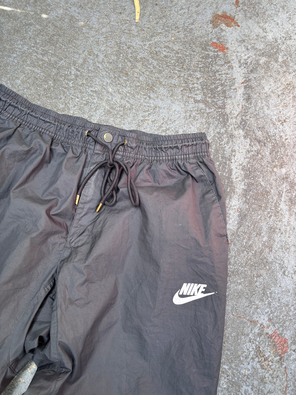 Nike Track Pants Women’s Size L Black Hip Logo Tapered Button Zip Drawstring